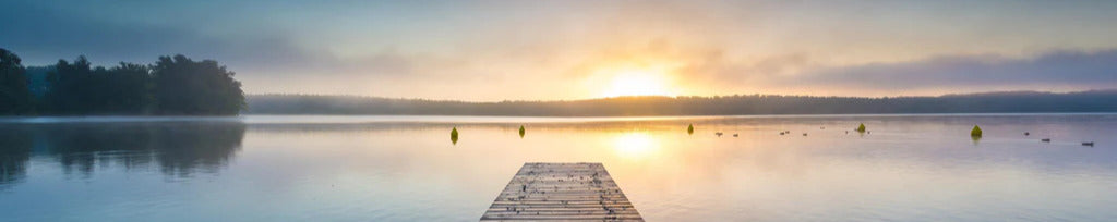 Küchenrückwand - Sonnenaufgang am See mit Nebel