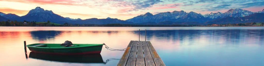 Küchenrückwand - Kleines Boot am Bergsee