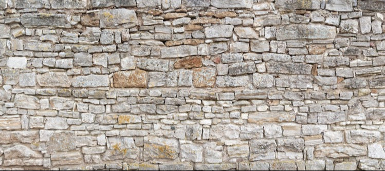 Küchenrückwand - Gräuliche alte Mauer aus groben Steinen