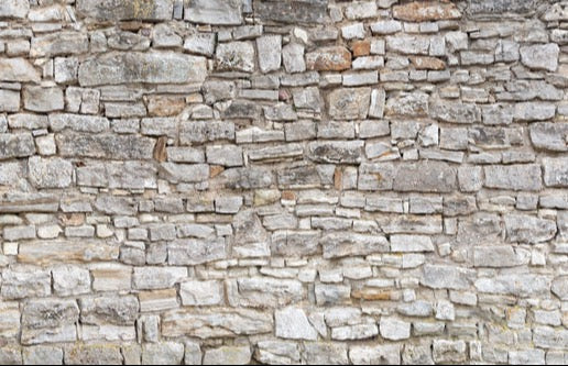 Küchenrückwand - Gräuliche alte Mauer aus groben Steinen