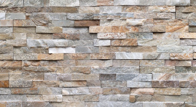 Küchenrückwand - Pastellfarbige Steinmauer