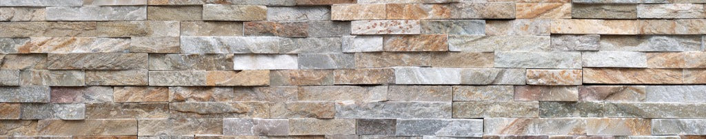 Küchenrückwand - Pastellfarbige Steinmauer