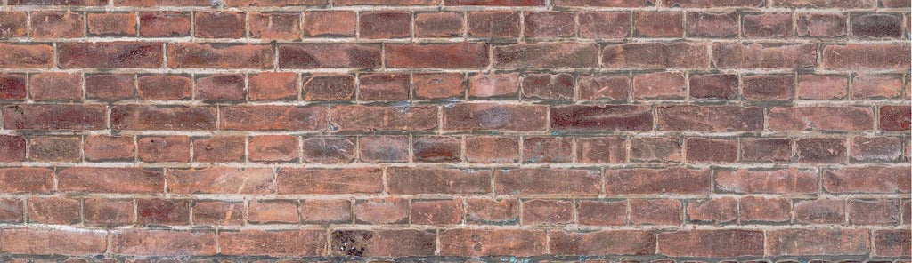 Küchenrückwand - Mauerstruktur aus alten braunen Ziegeln