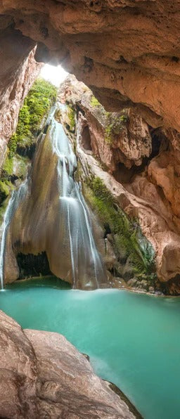 Duschrückwand - Wasserfall in Höhle mit See in Valencia
