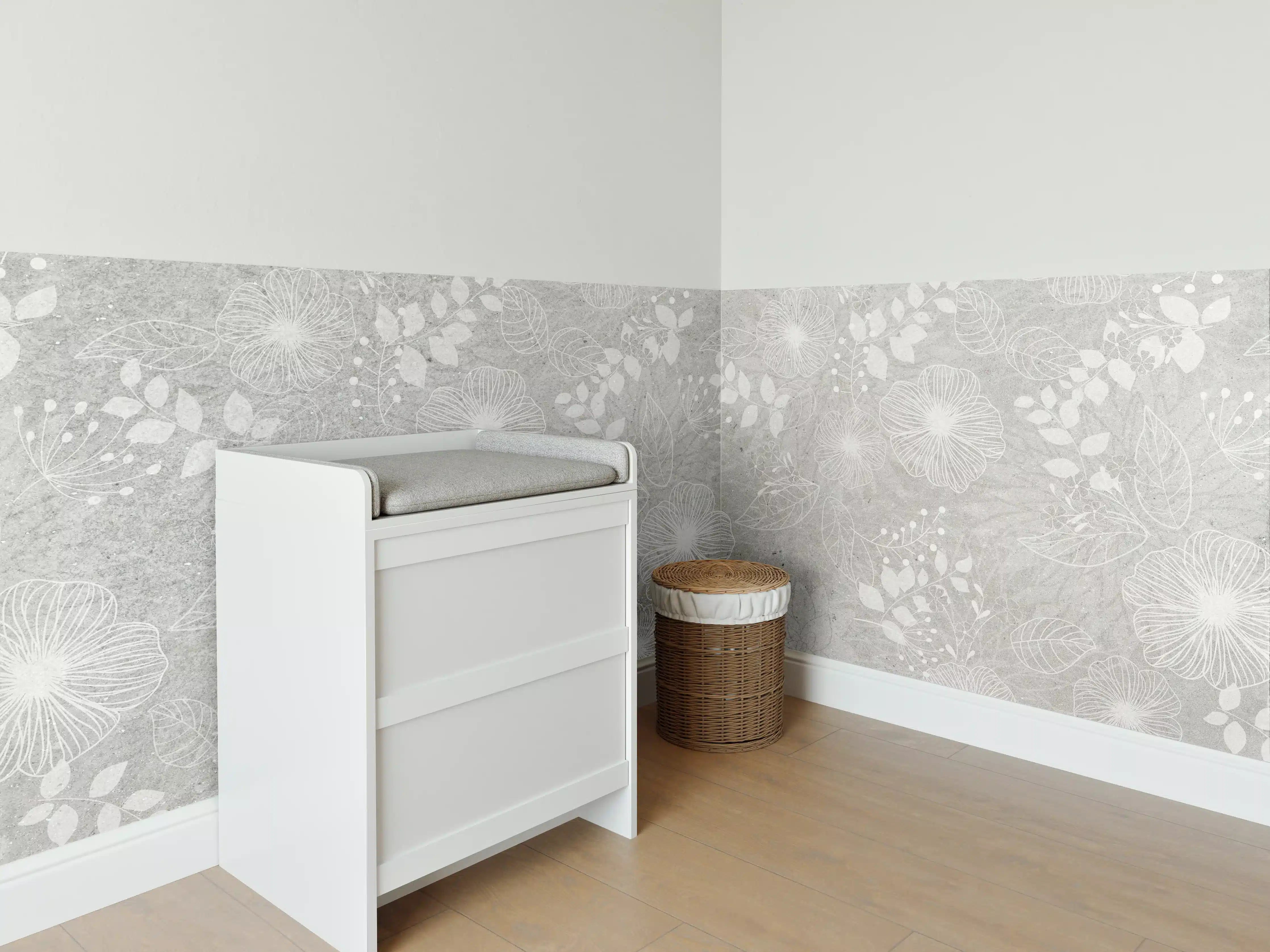 Babyzimmer Wandgestaltung - Blumen auf grauem Beton
