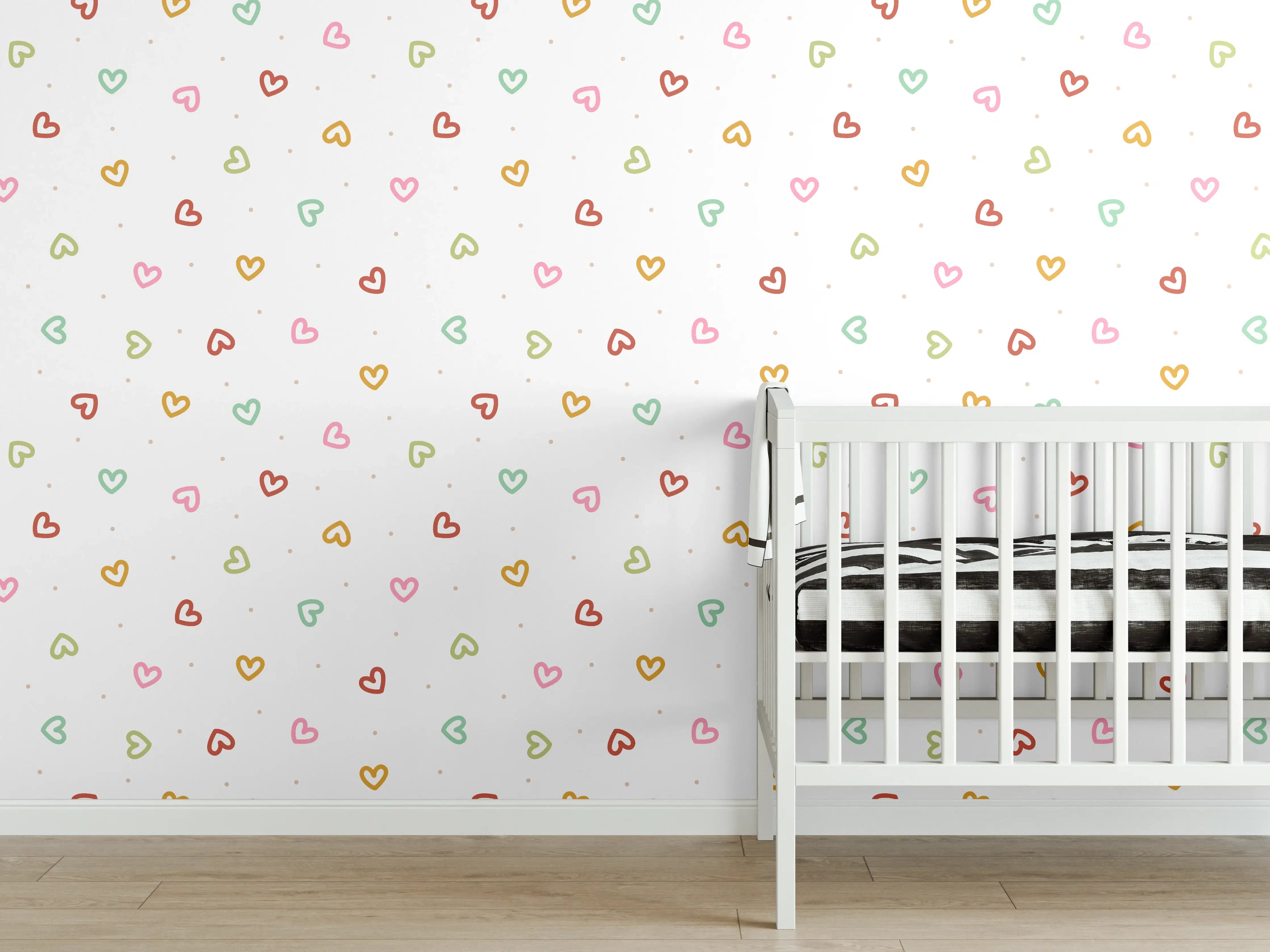 Babyzimmer Wandgestaltung - Bunte Herzchen auf weißem Hintergrund