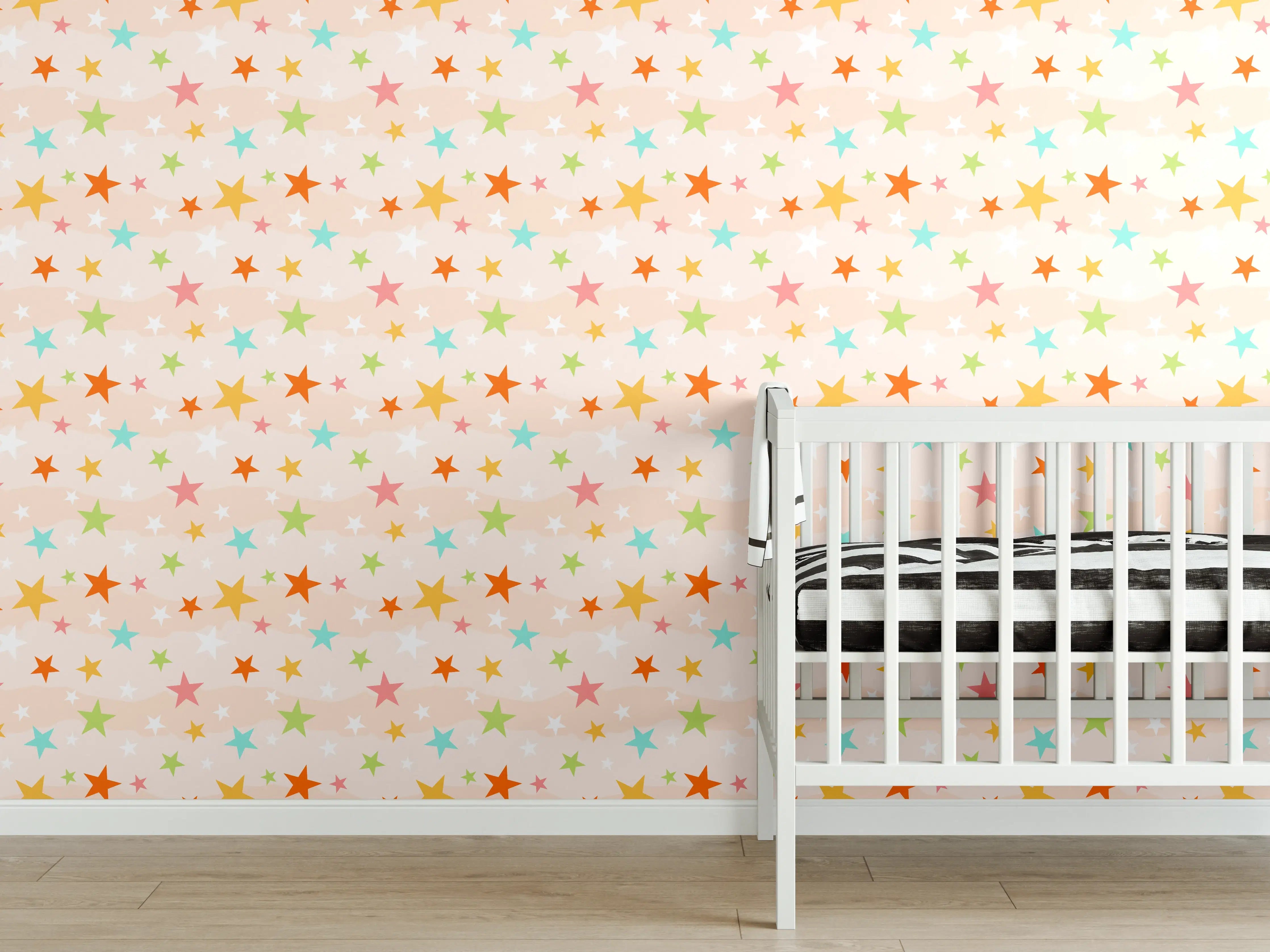 Babyzimmer Wandgestaltung - Bunte Sternenmuster auf Pastellhintergrund