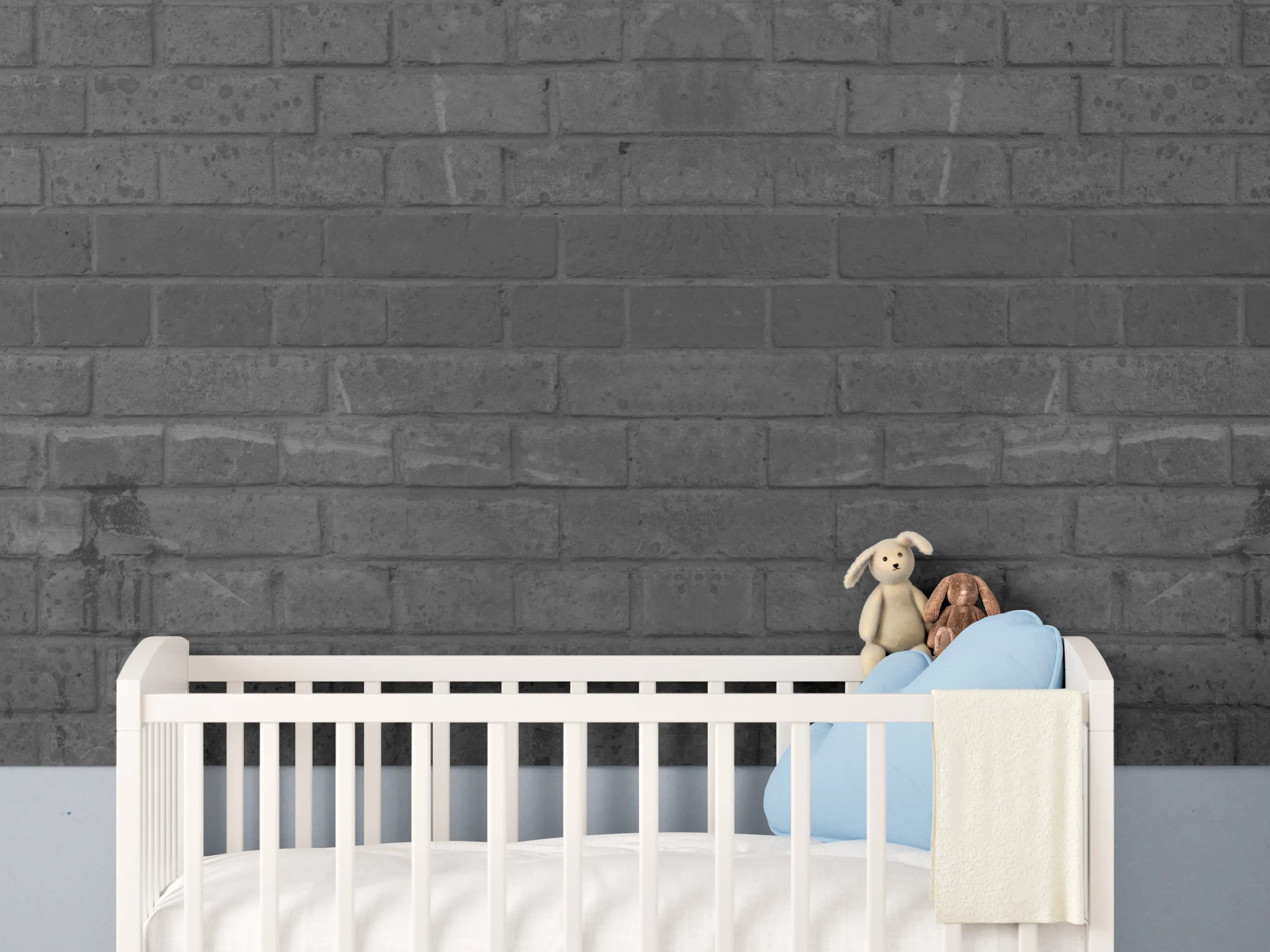 Babyzimmer Wandgestaltung - Dunkle abgenutzte Ziegelmauer