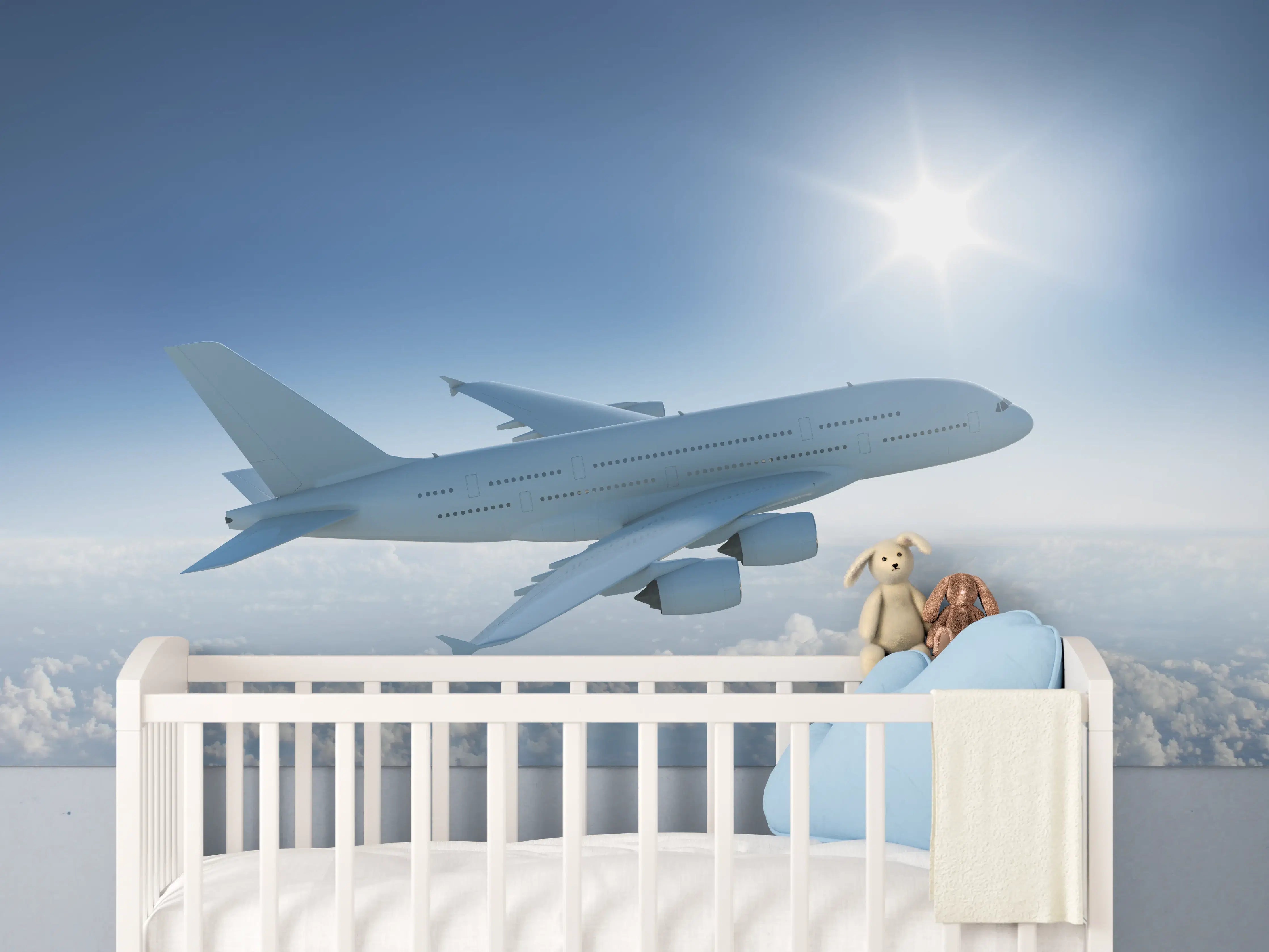 Babyzimmer Wandgestaltung - Flugzeug über weißen Wolken