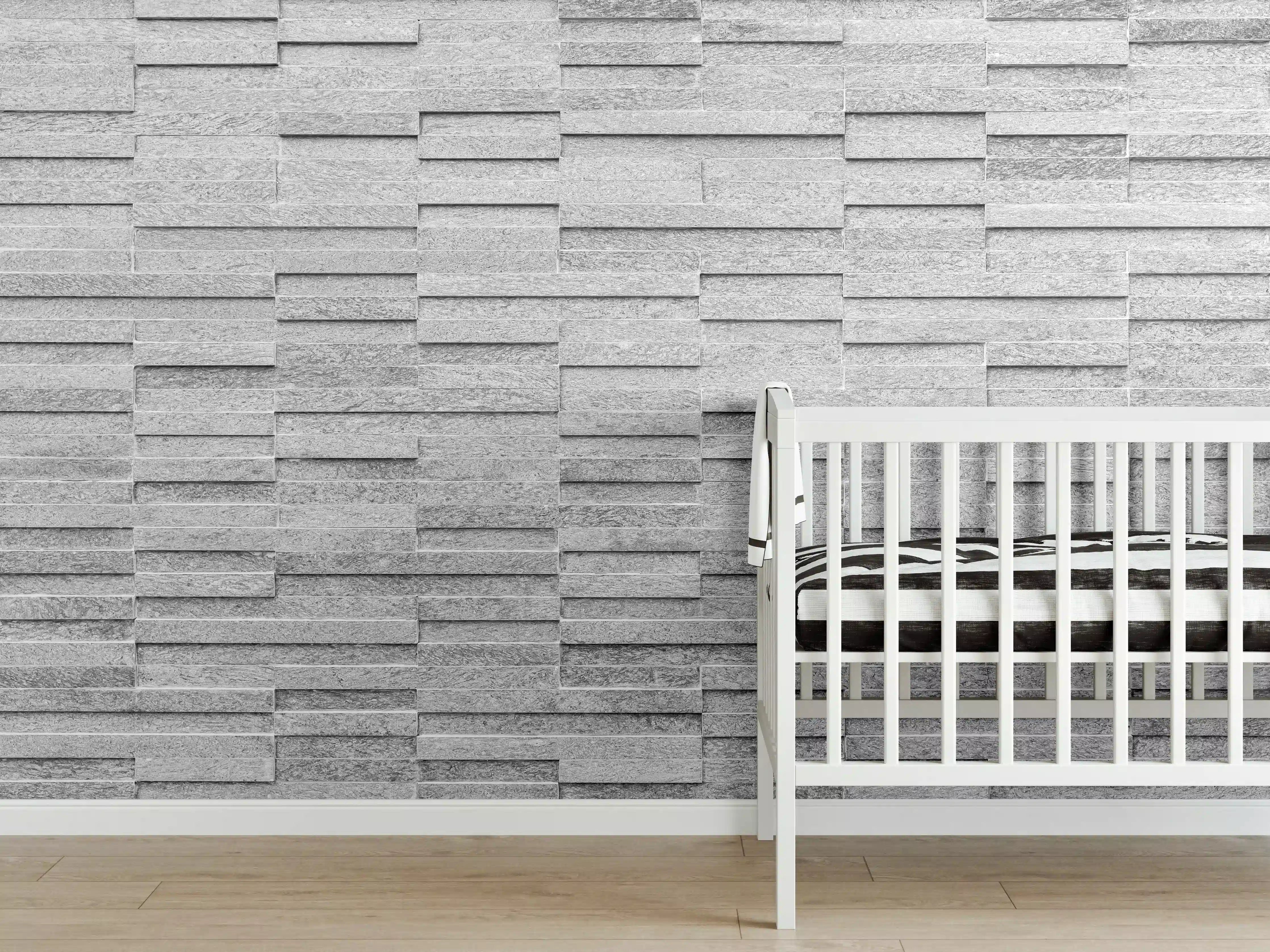 Babyzimmer Wandgestaltung - Geriffelte gräuliche Backsteinmauer