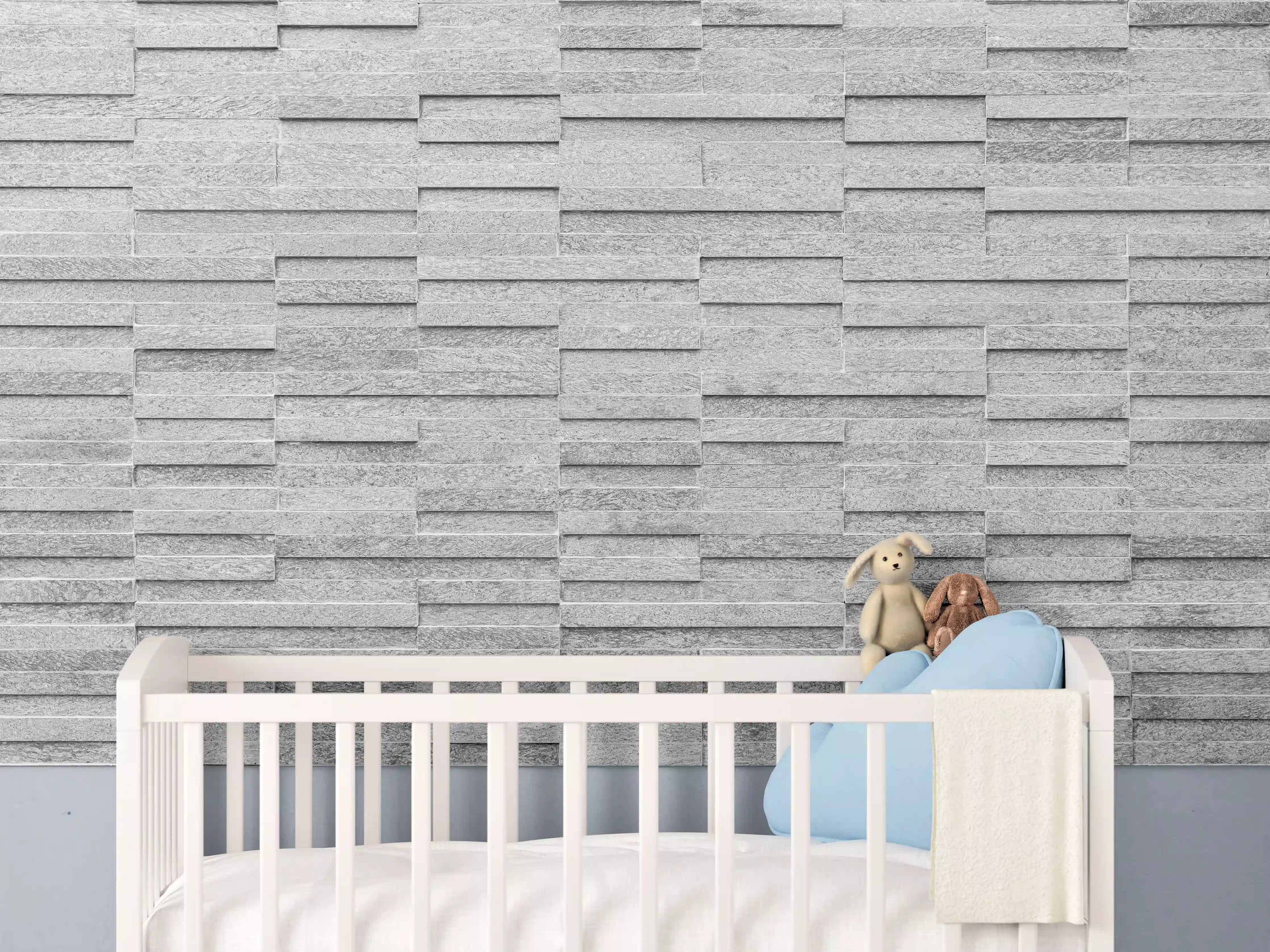 Babyzimmer Wandgestaltung - Geriffelte gräuliche Backsteinmauer