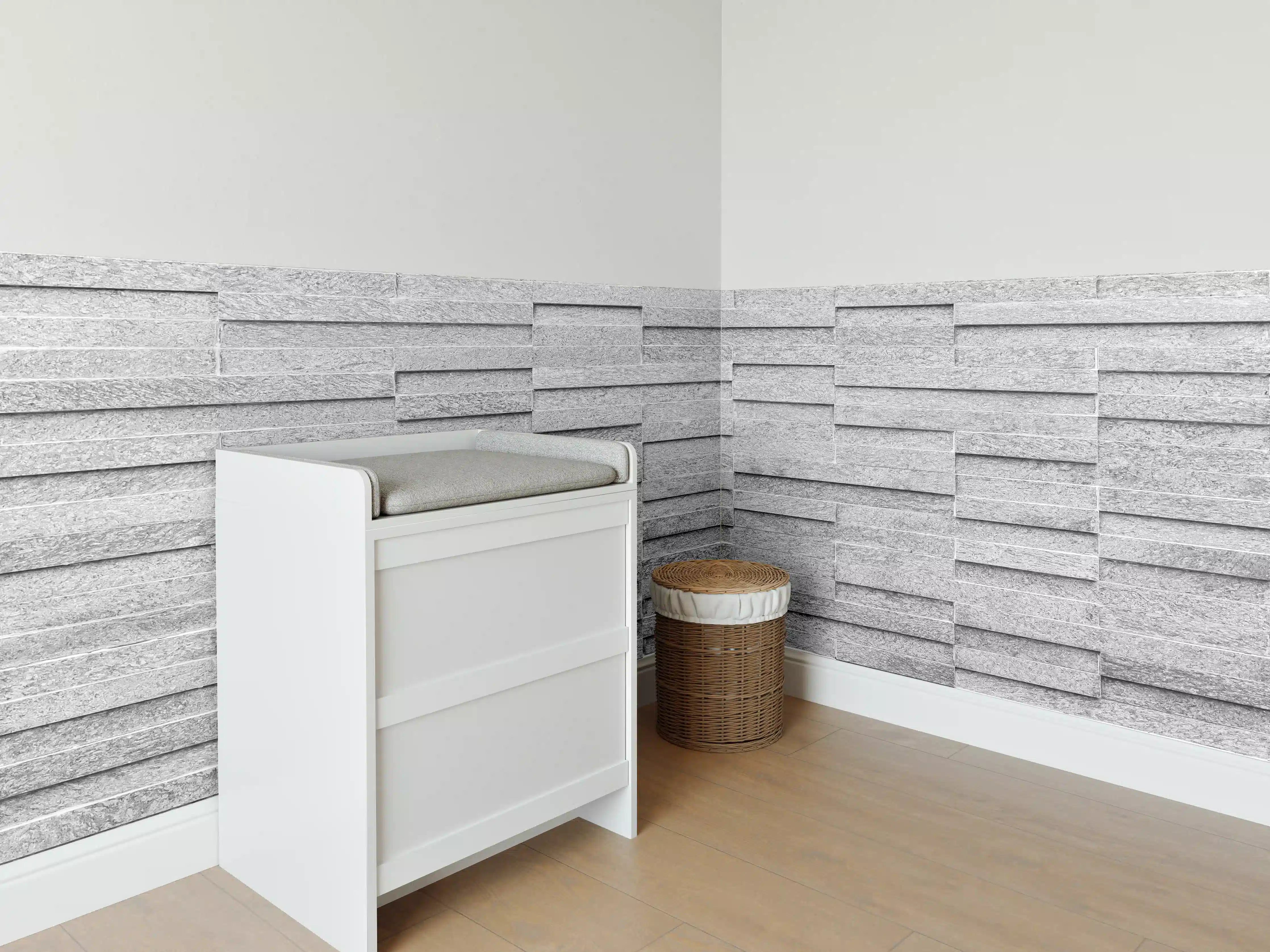 Babyzimmer Wandgestaltung - Geriffelte gräuliche Backsteinmauer