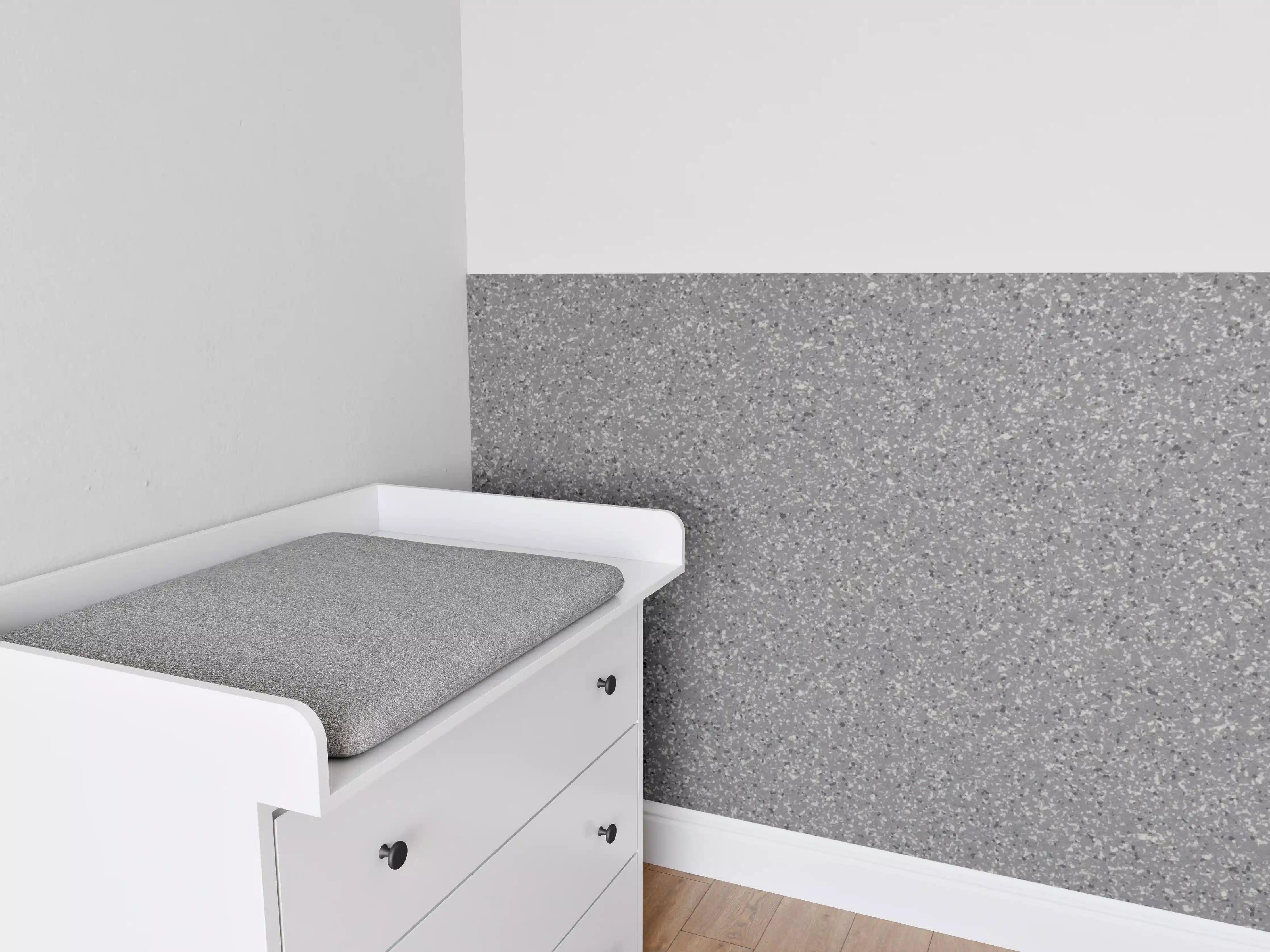 Babyzimmer Wandgestaltung - Grau strukturierte Wand im minimalistischen Stil