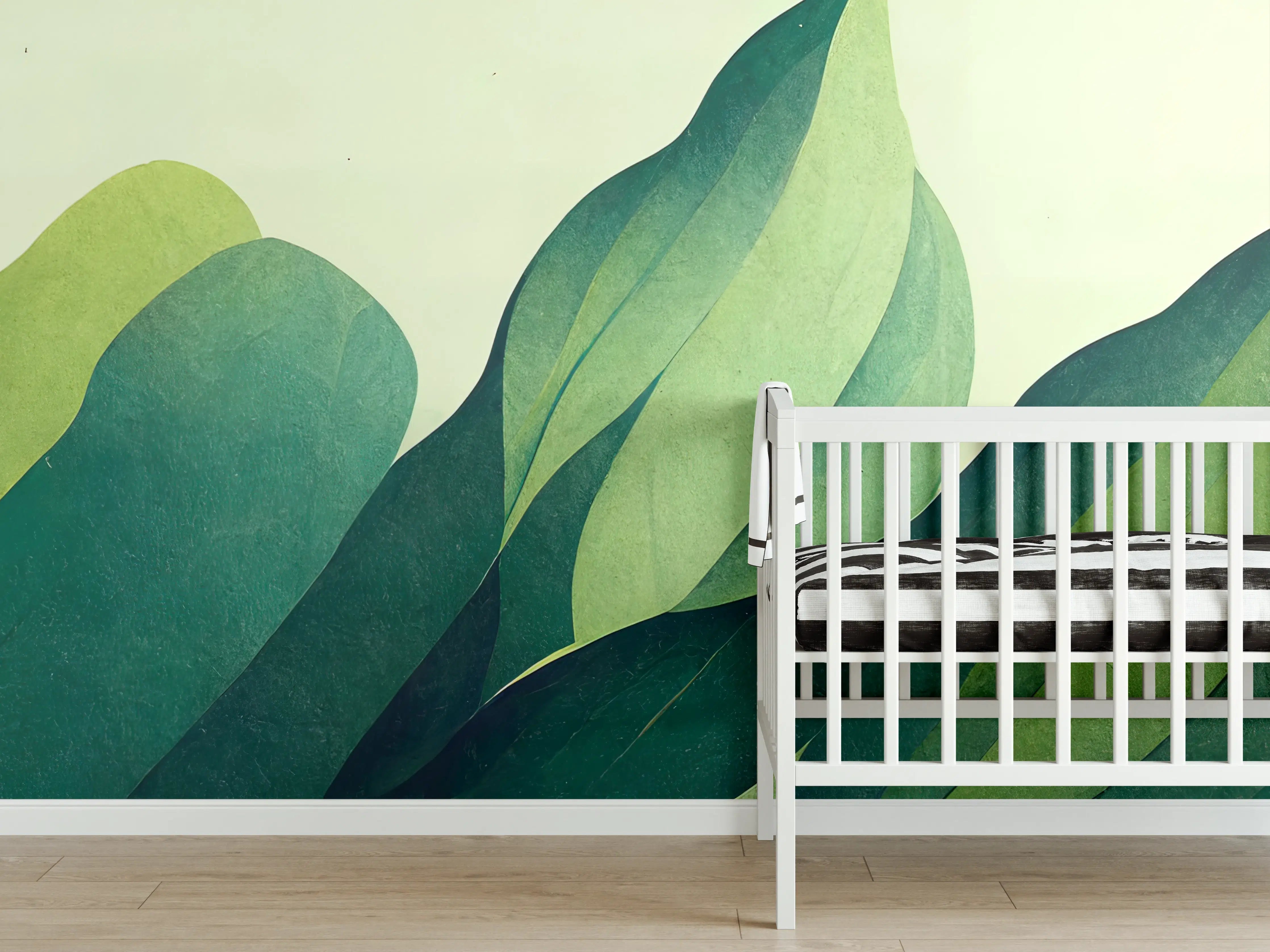 Babyzimmer Wandgestaltung - Grüne Blätter in sanfter Farbpalette