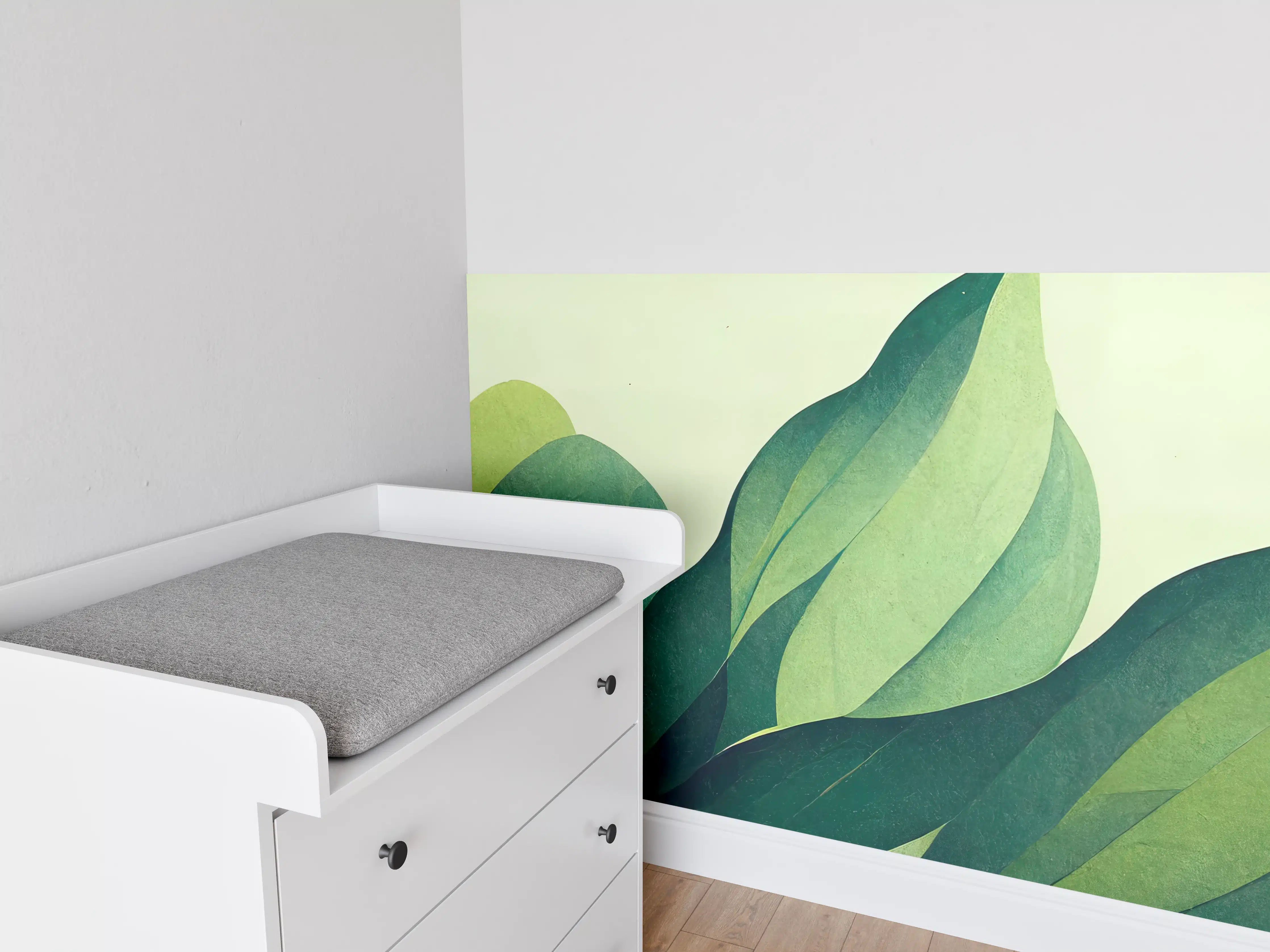 Babyzimmer Wandgestaltung - Grüne Blätter in sanfter Farbpalette