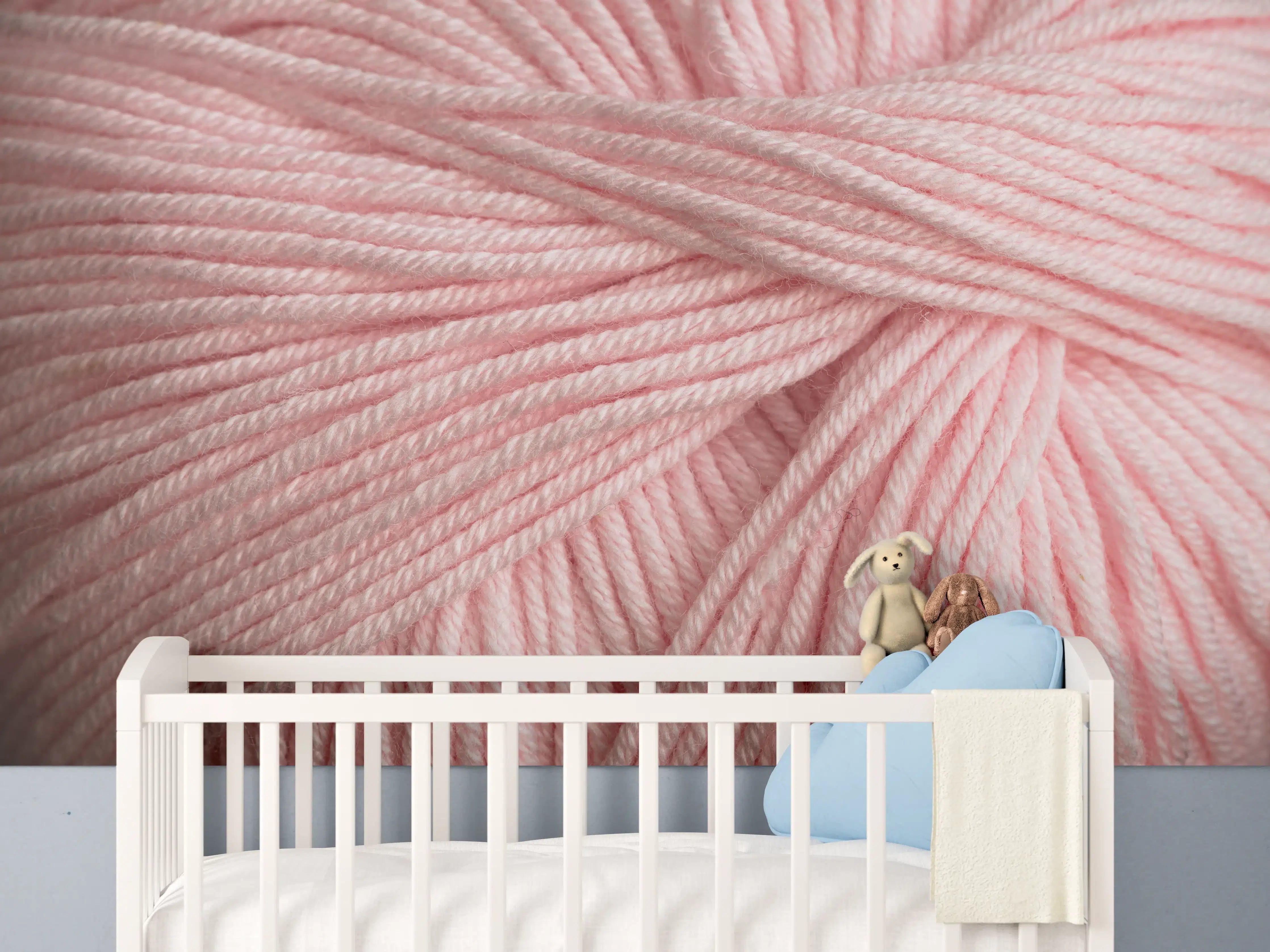 Babyzimmer Wandgestaltung - Nahaufnahme eines rosa Garnknäuels