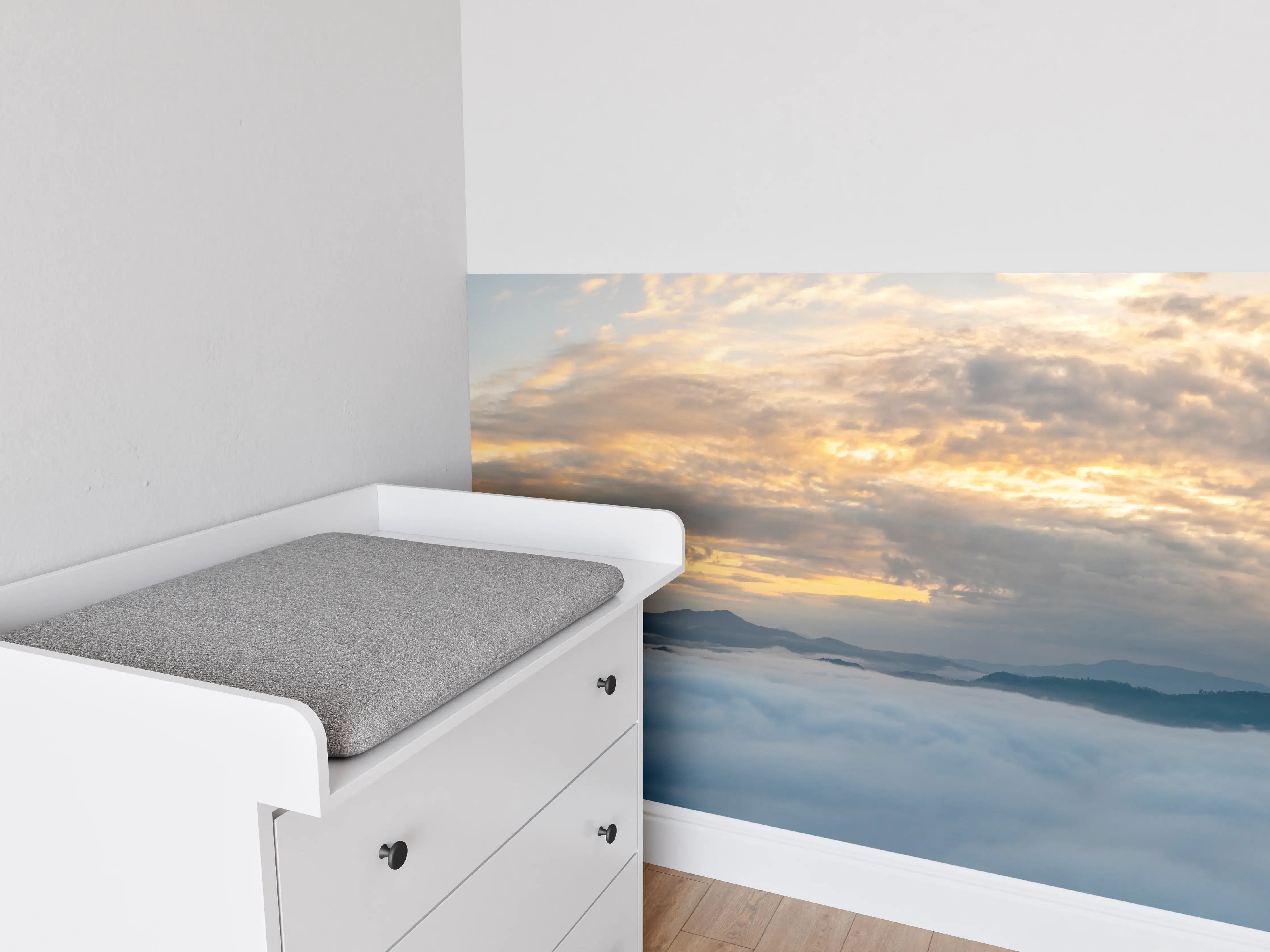 Babyzimmer Wandgestaltung - Sonnenuntergang über Wolkenmeer