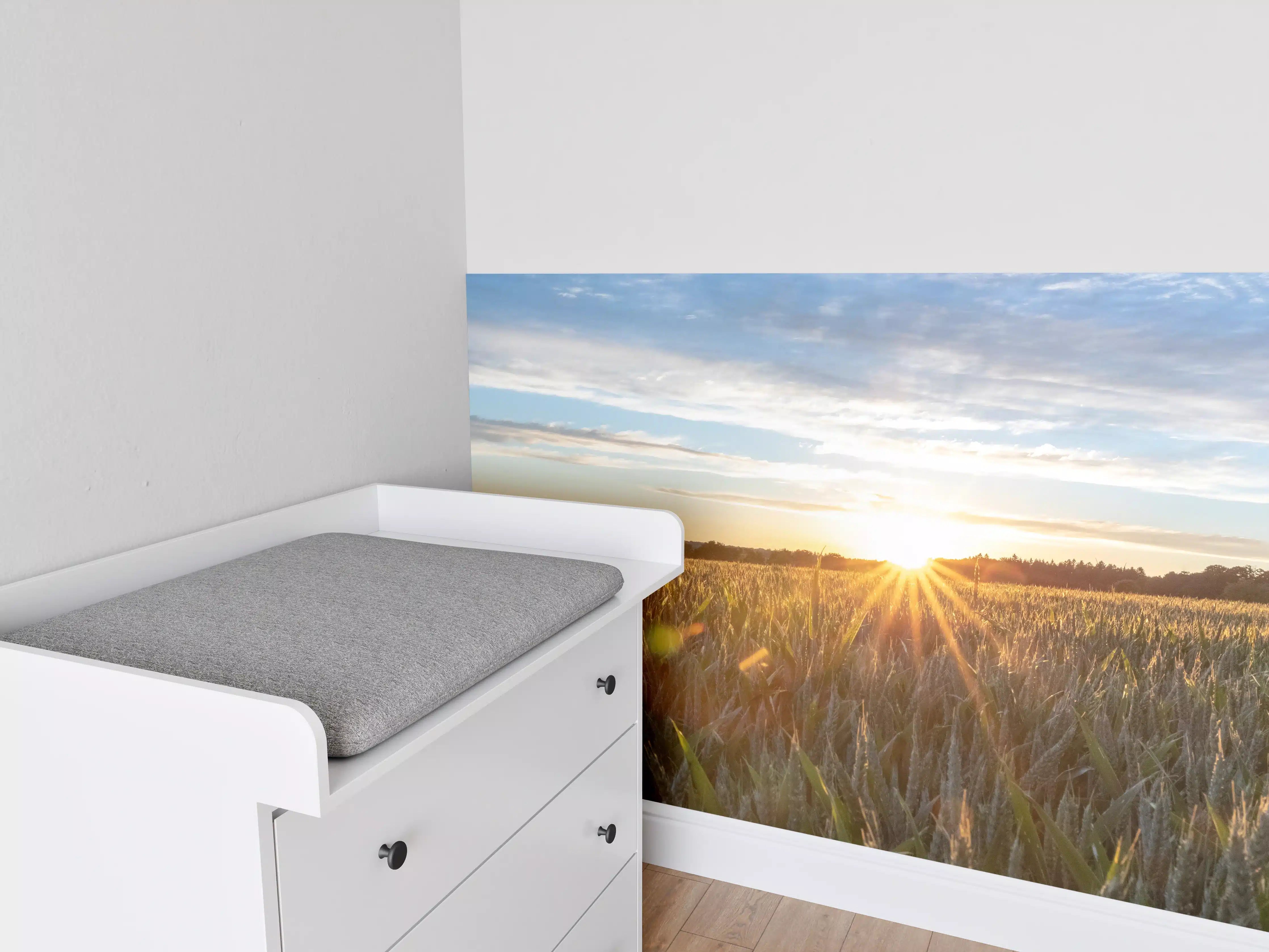 Babyzimmer Wandgestaltung - Sonnenuntergang über einem Kornfeld