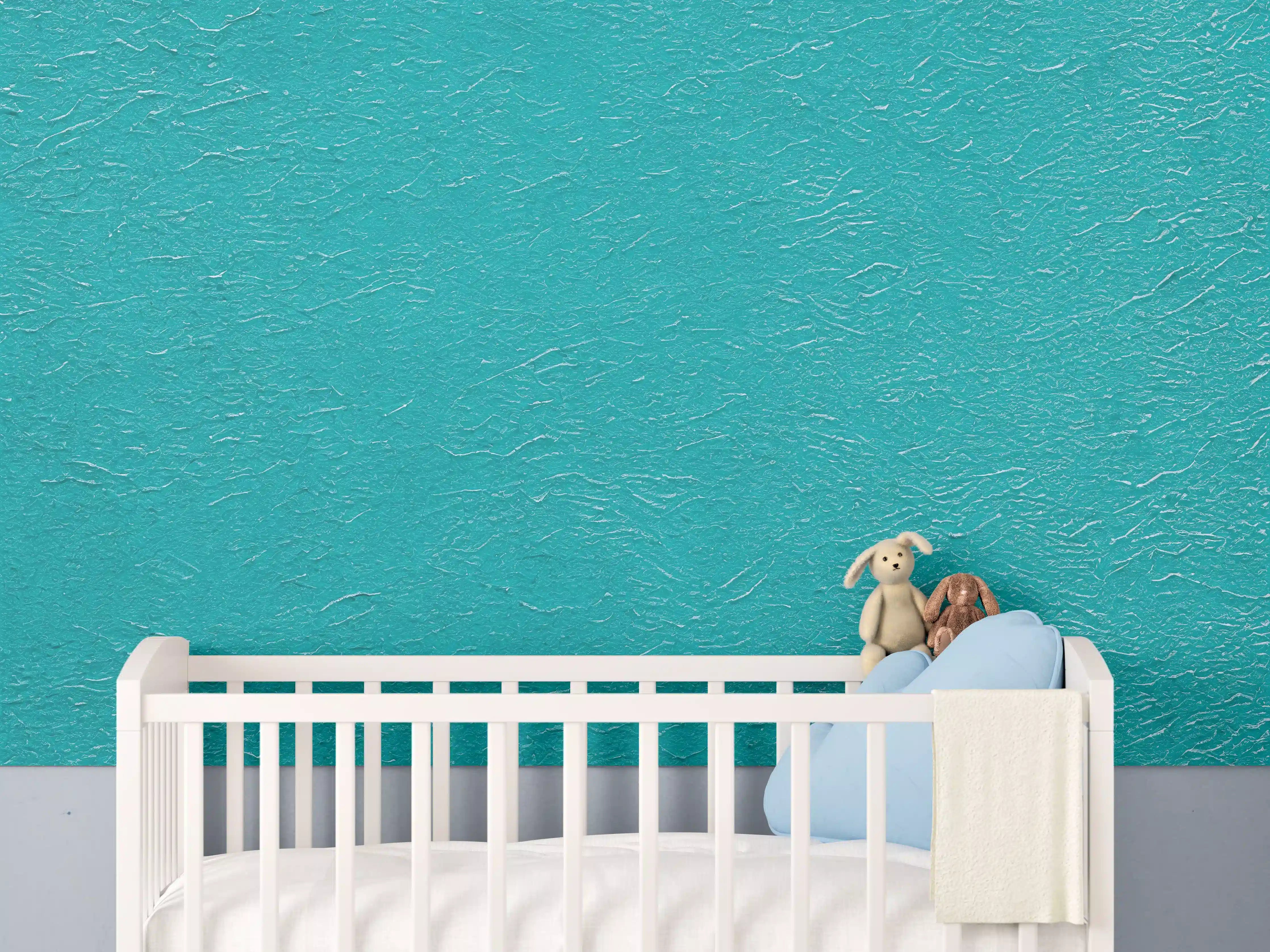 Babyzimmer Wandgestaltung - Türkisfarbene Strukturwand mit subtilen Oberflächenmustern