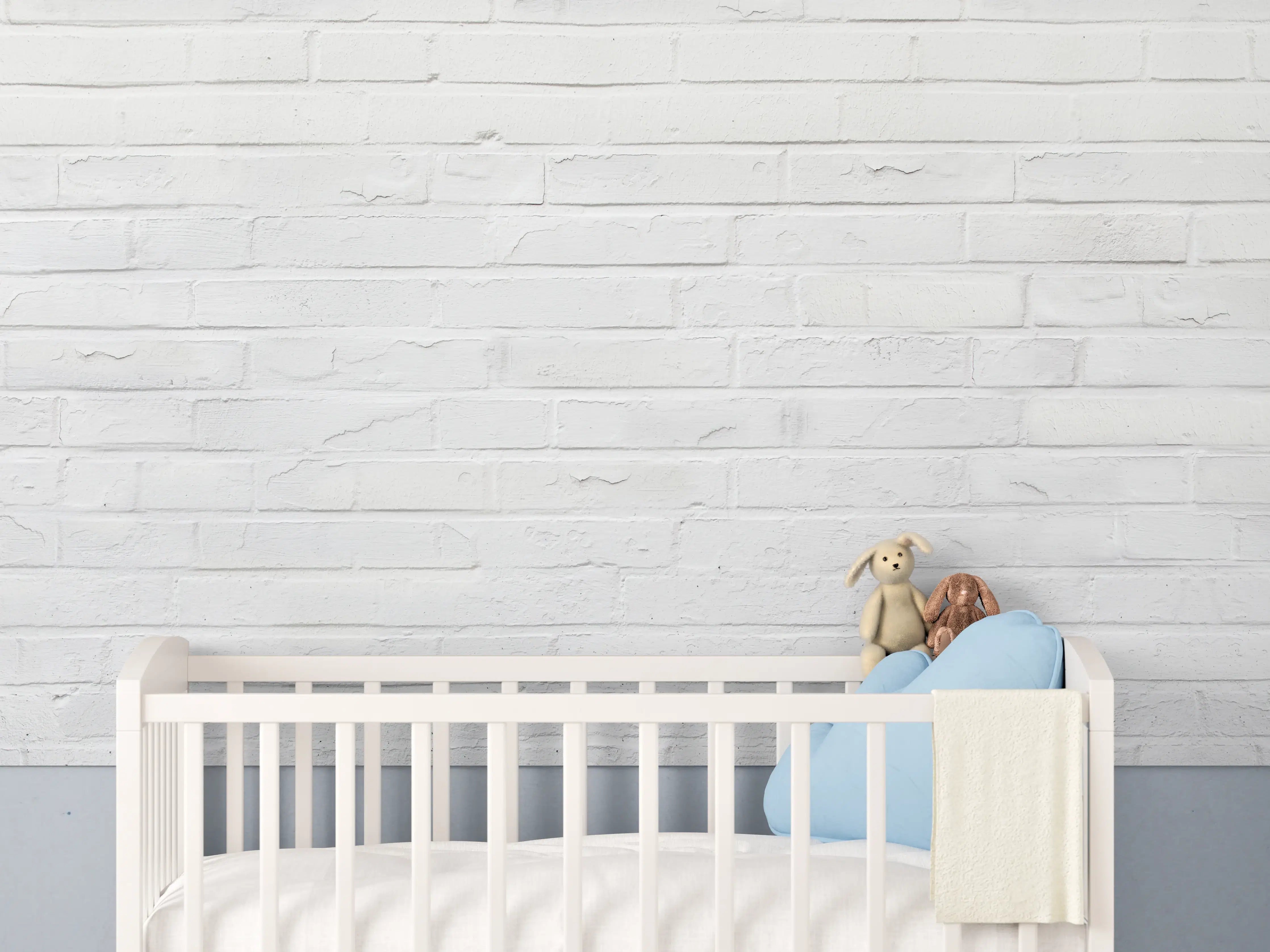 Babyzimmer Wandgestaltung - Weiße zerschlagene Ziegelsteinmauer