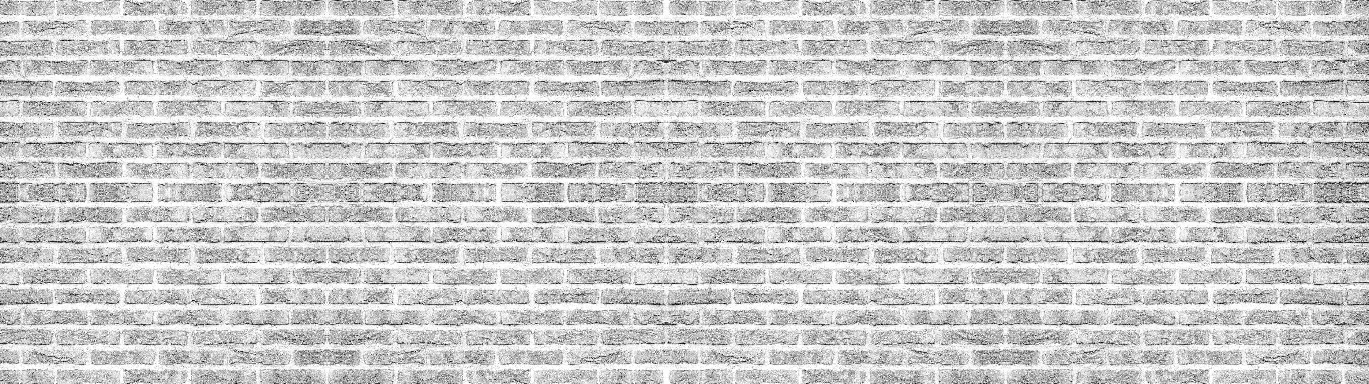 Badewannen-Rückwand-Graue alte Ziegelwand