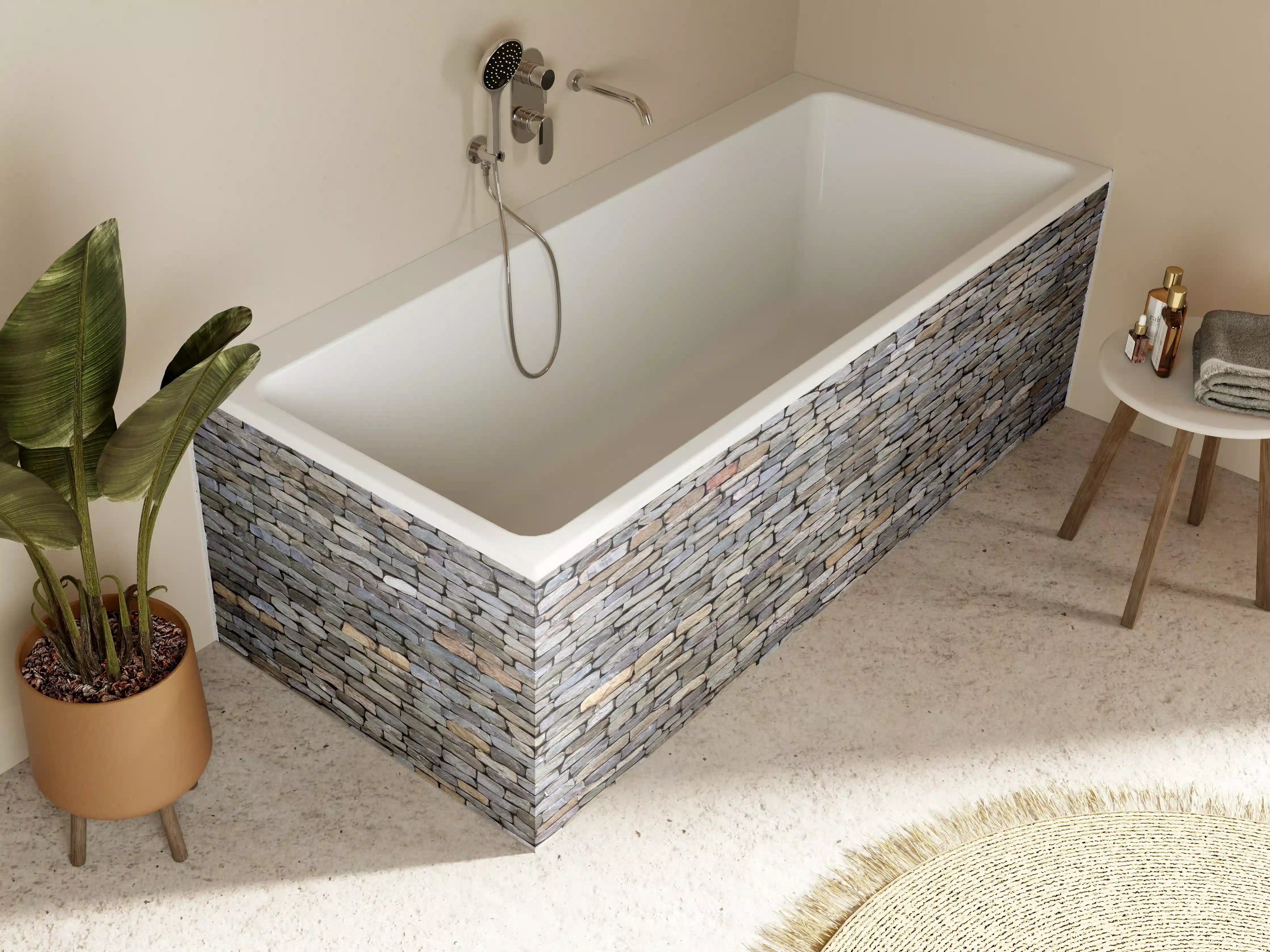 Badewannen-Rückwand - Pastellfarbene Steinmauer