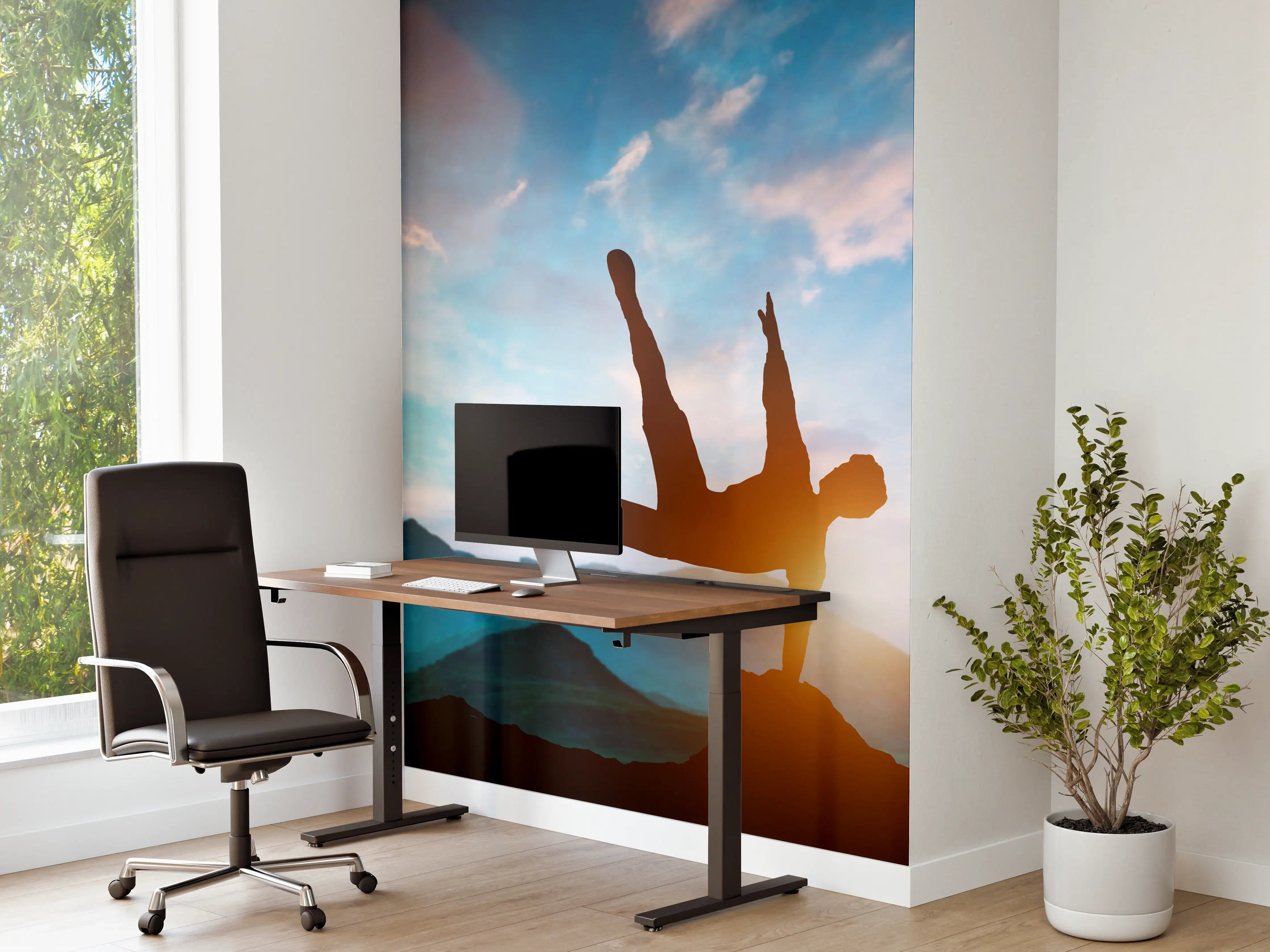 Büro Wandgestaltung - Parkour Aktion in den Bergen über Felsen.