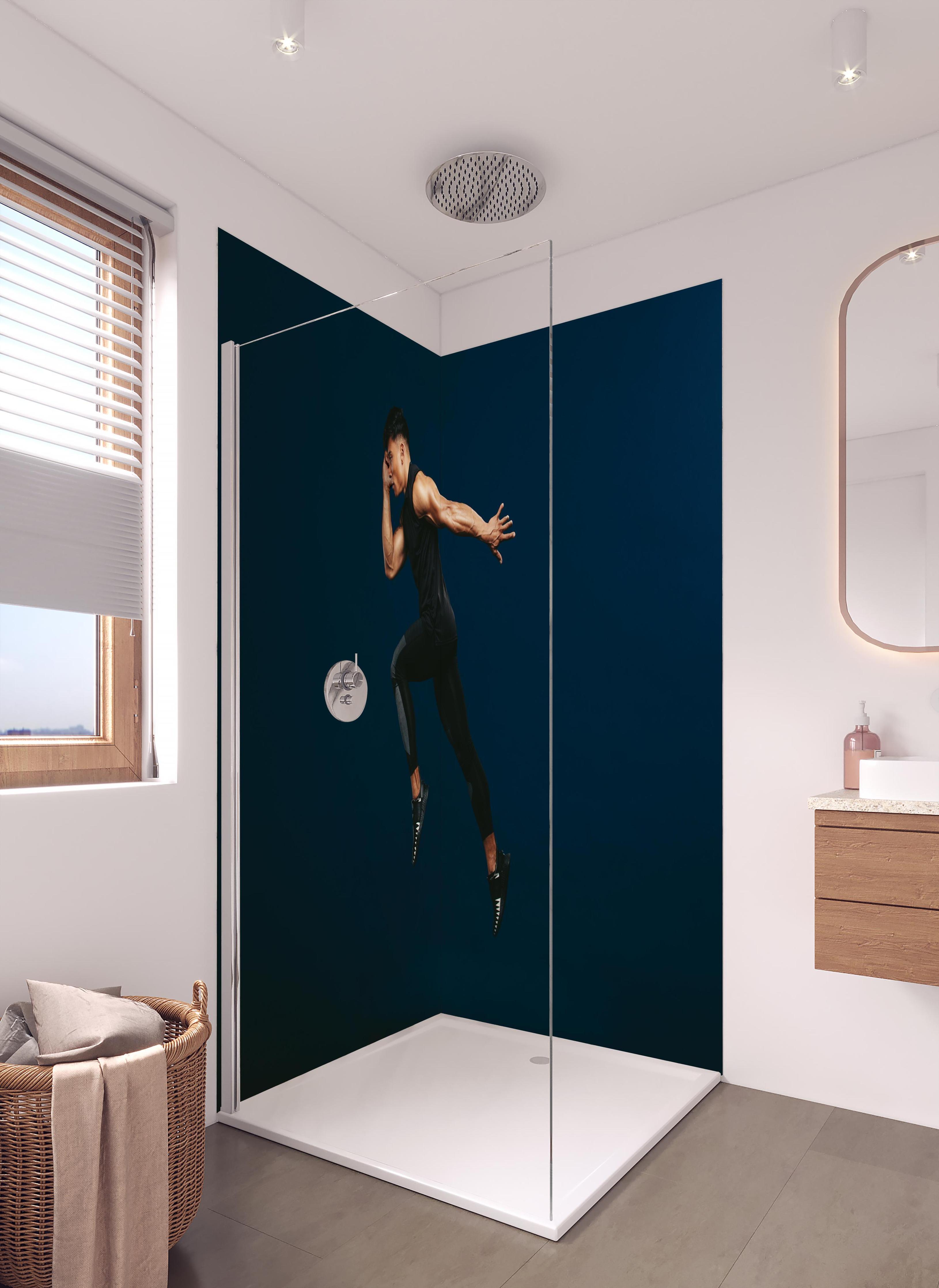 Duschrückwand - Sportler bei einem Sprung in hellem Badezimmer mit Regenduschkopf - zweiteilige Eck-Duschrückwand