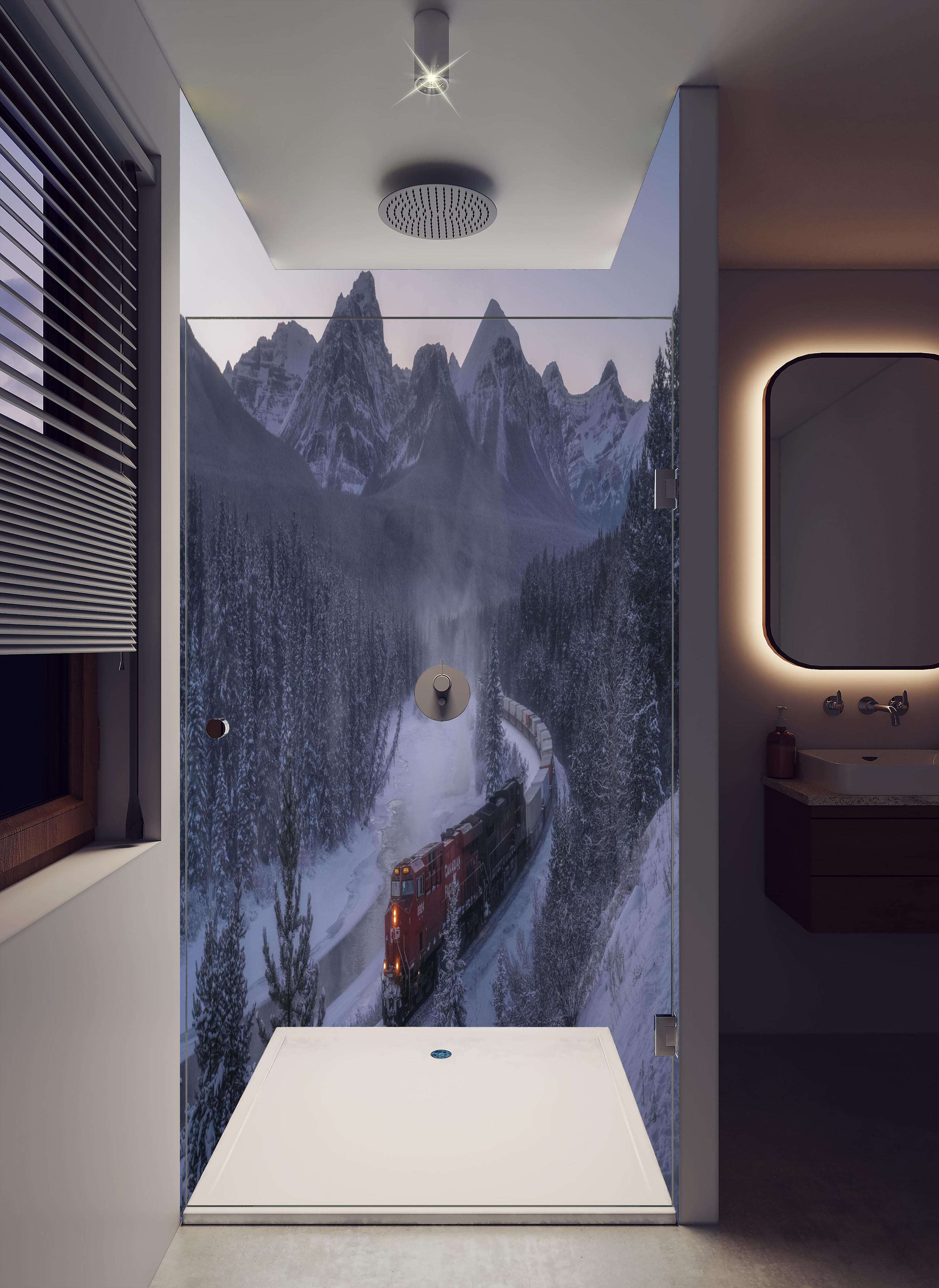 Duschrückwand - Roter Zug fährt durch verschneite Berglandschaft in hellem Badezimmer mit Regenduschkopf - zweiteilige Eck-Duschrückwand