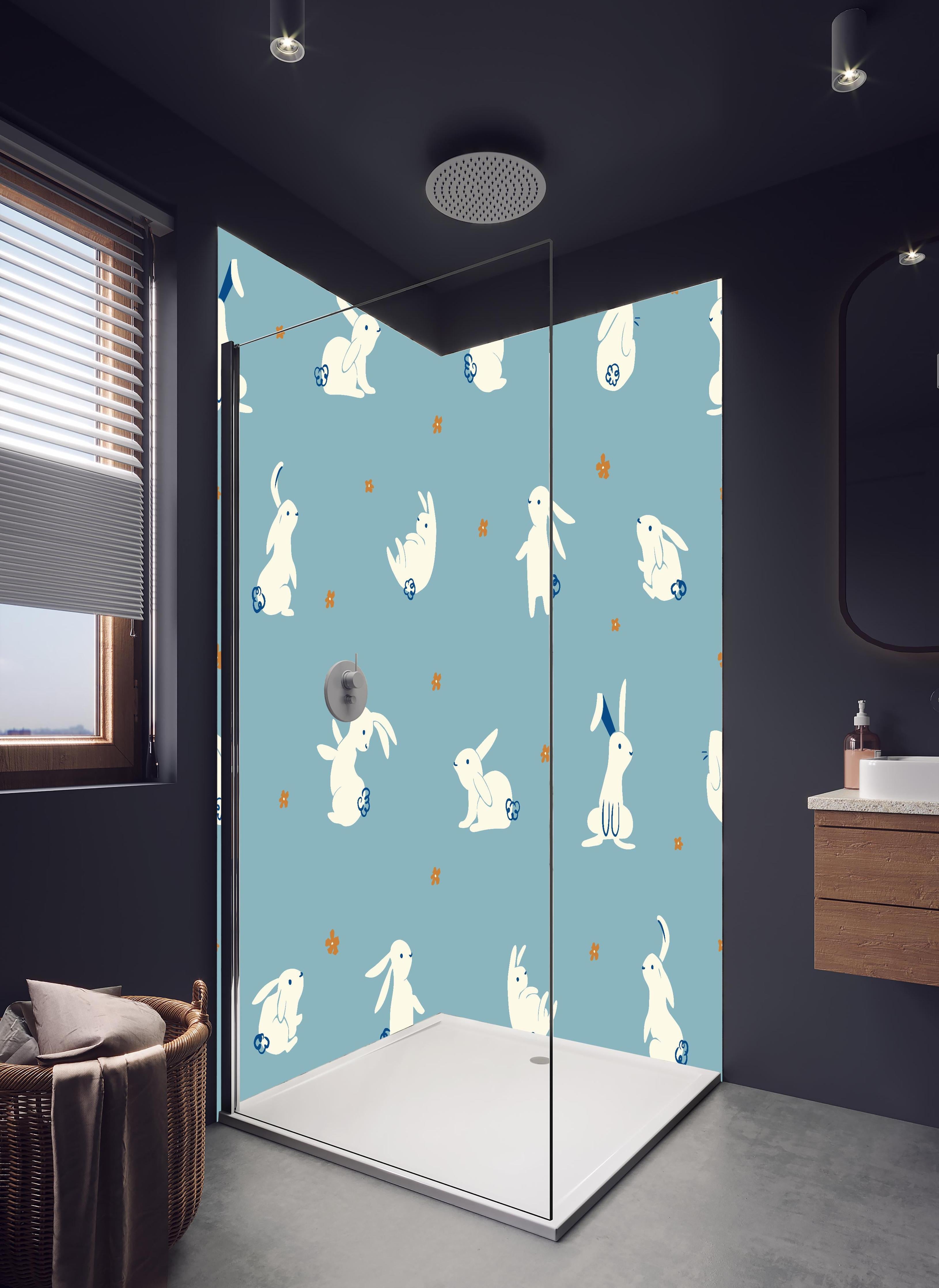 Duschrückwand - Süße Häschen auf Blau - Kinderstoffdesign in hellem Badezimmer mit Regenduschkopf - zweiteilige Eck-Duschrückwand