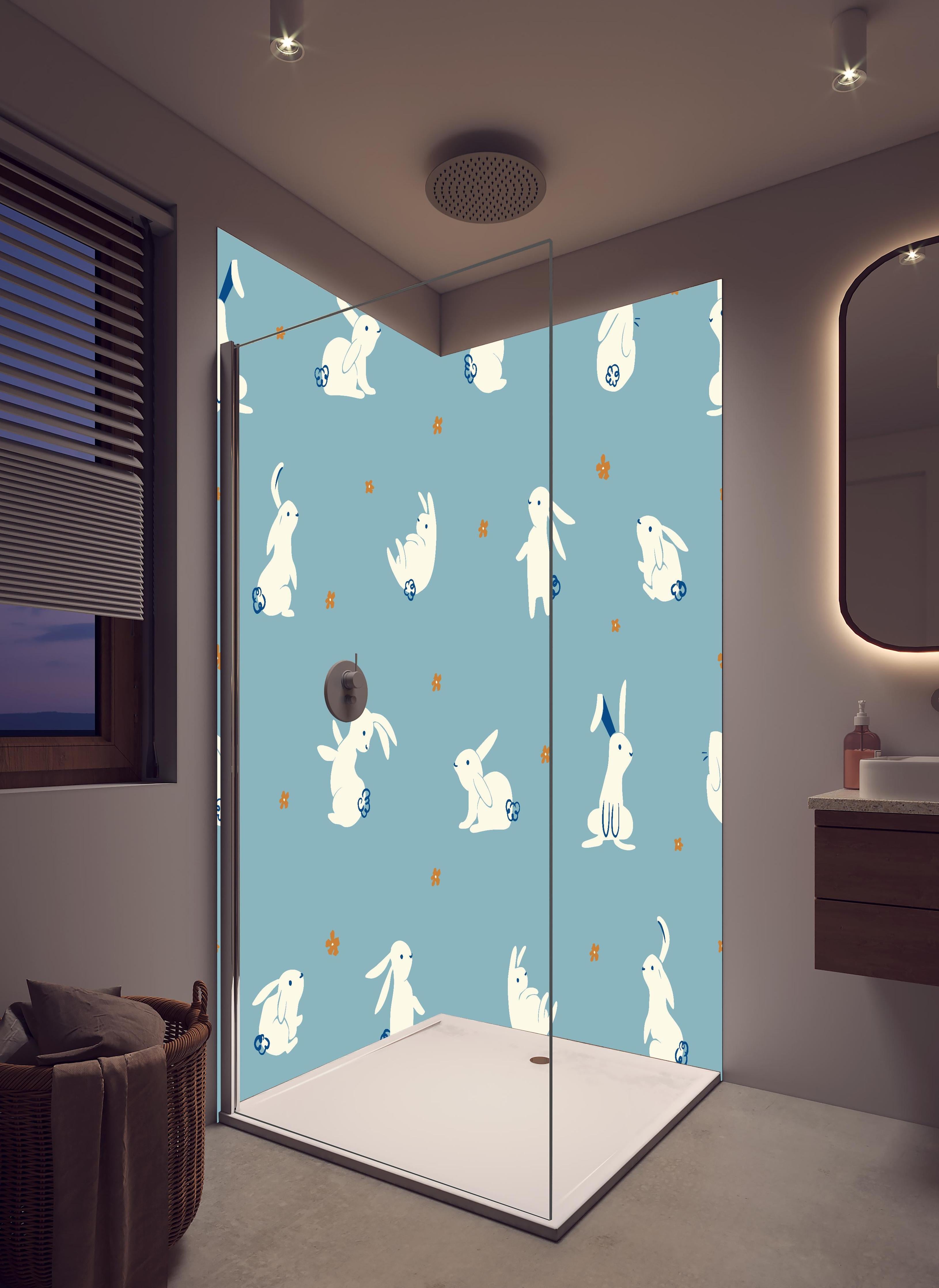 Duschrückwand - Süße Häschen auf Blau - Kinderstoffdesign in hellem Badezimmer mit Regenduschkopf - zweiteilige Eck-Duschrückwand