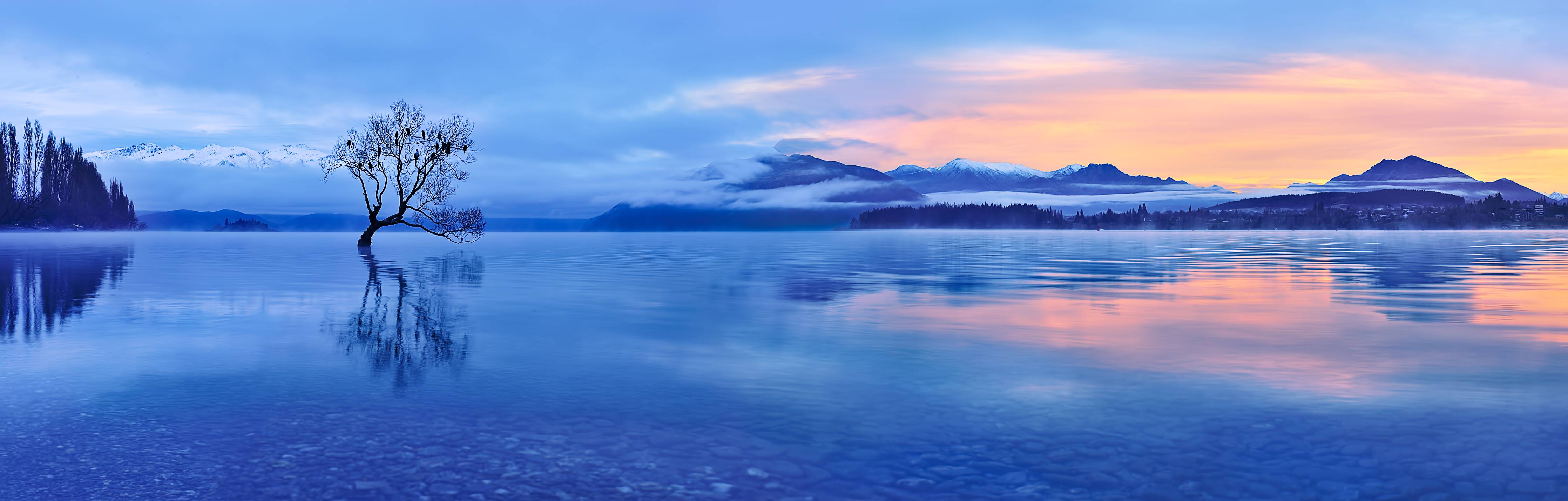 Große Wandbilder-Blaue Seenlandschaft bei Sonnenuntergang