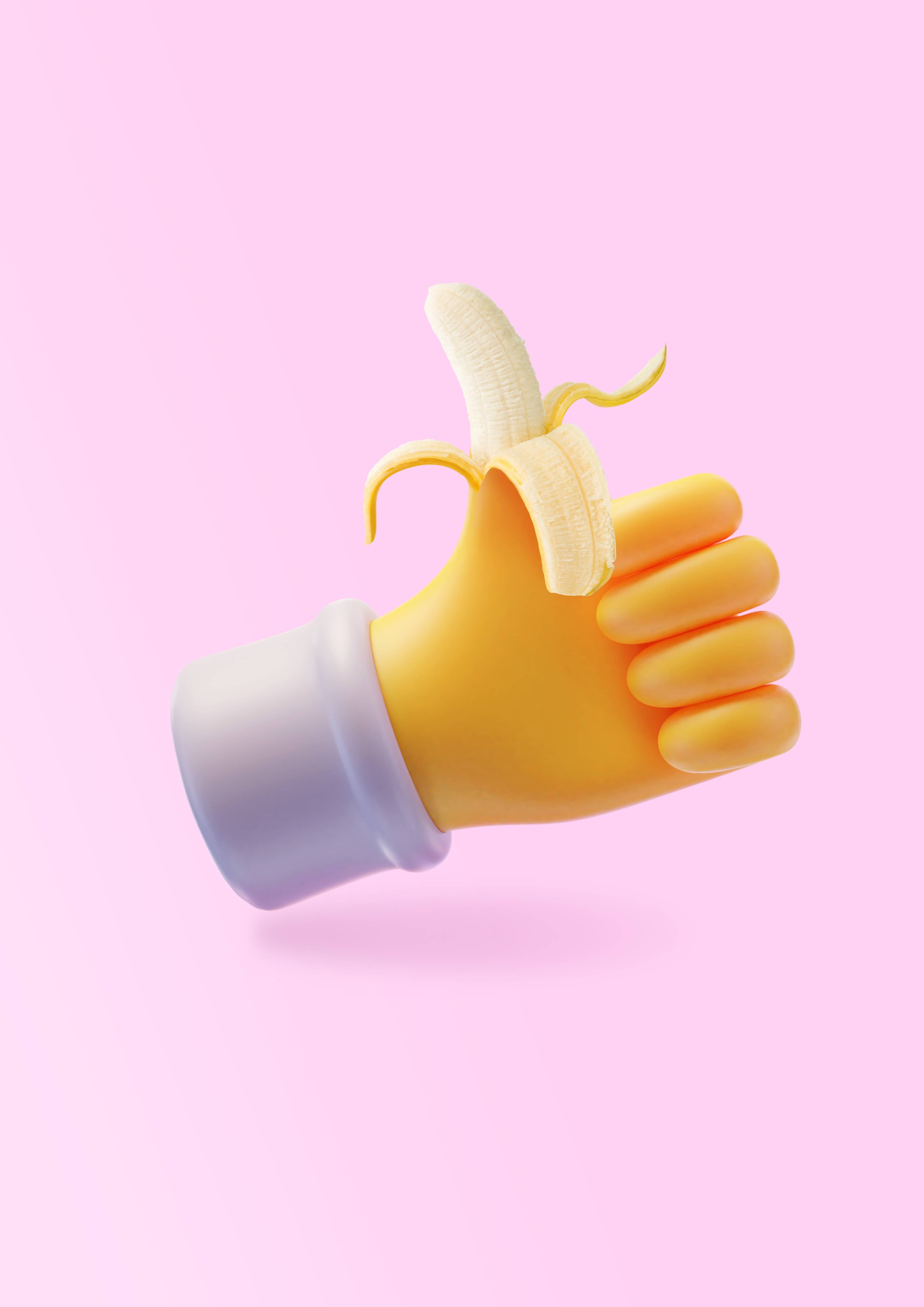 Große Wandbilder-Bunte Bananenhand mit Daumen hoch