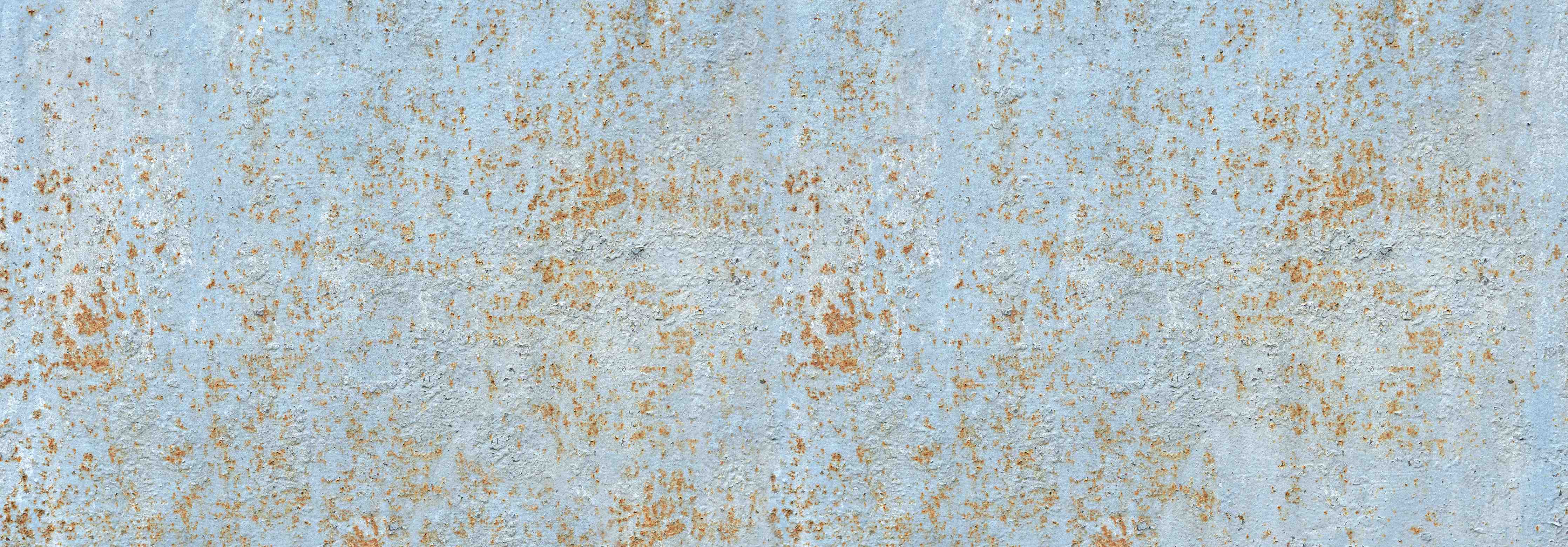 Große Wandbilder-Farbflocken auf rostigem Metallblech