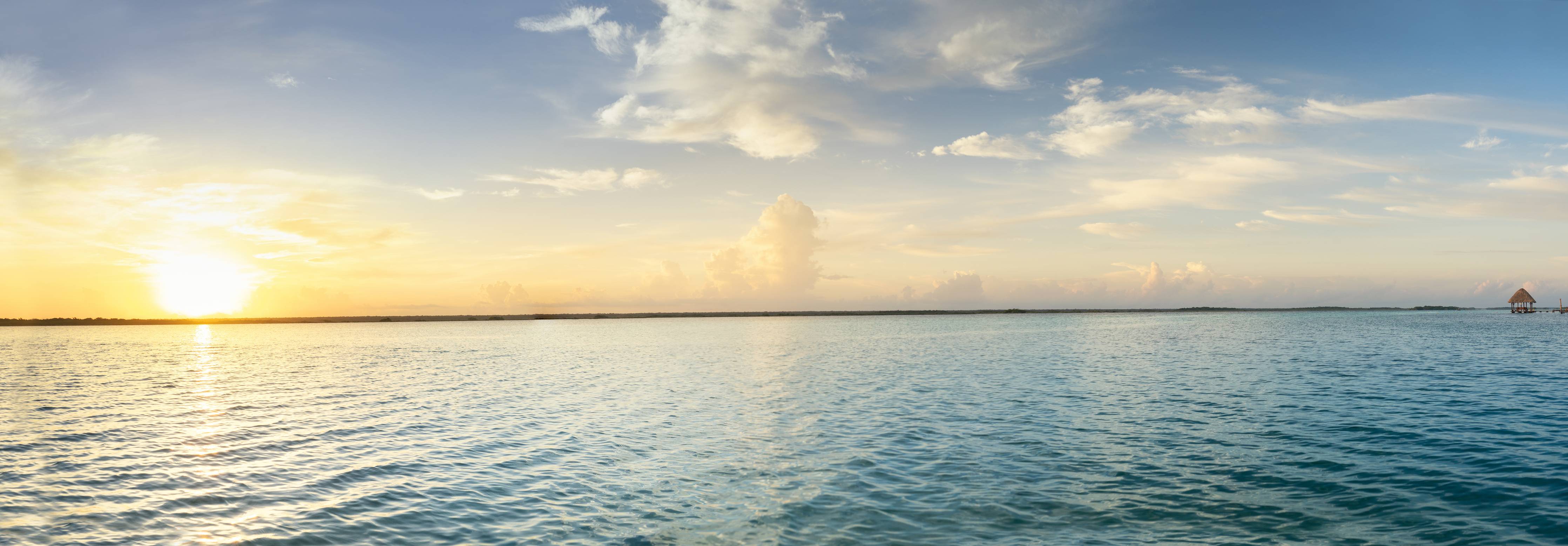 Große Wandbilder-Sonnenuntergang über dem Meer mit sanften Wolken