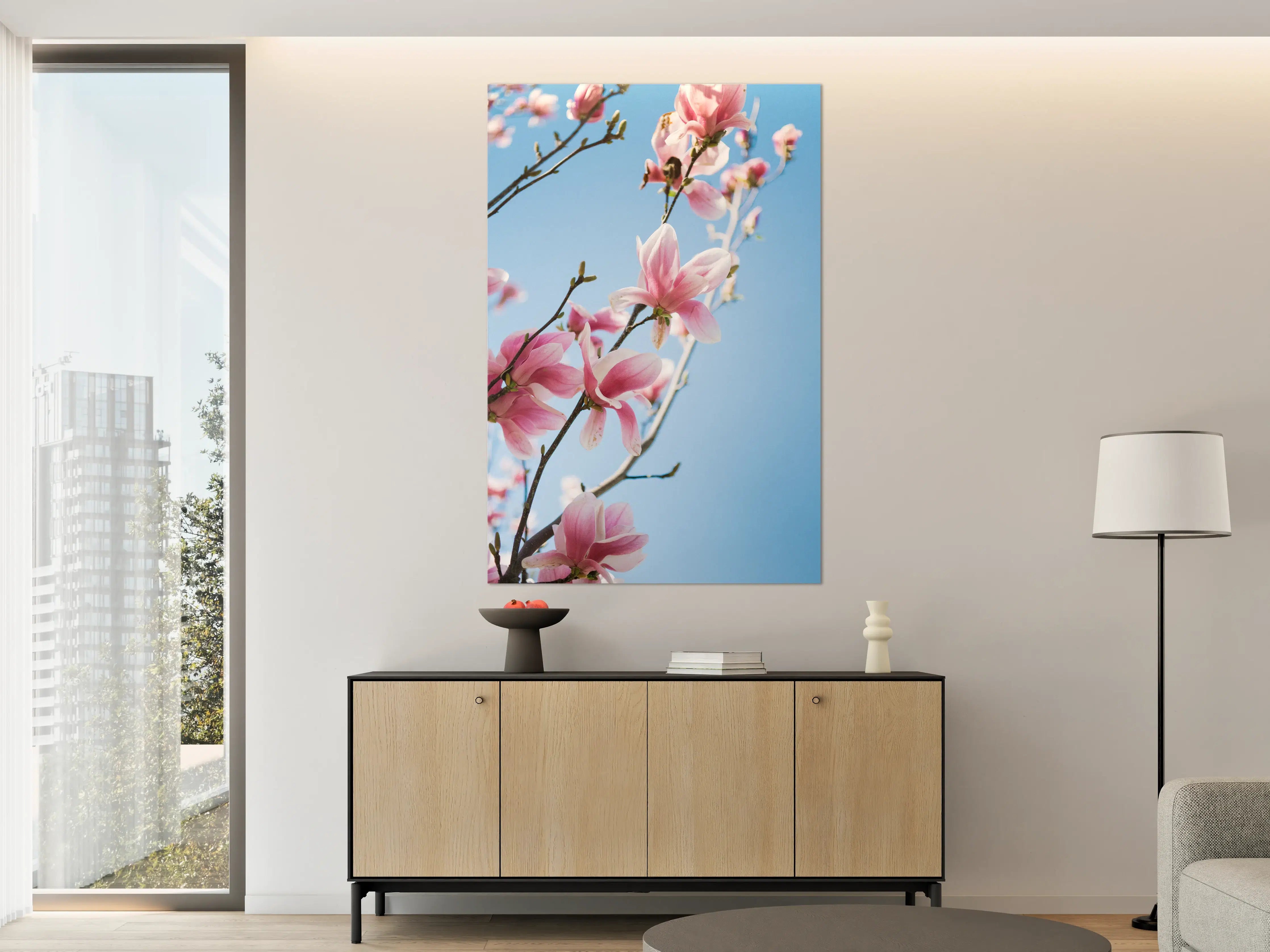 Große Wandbilder - Zartrosa Magnolienblüten vor blauem Himmel