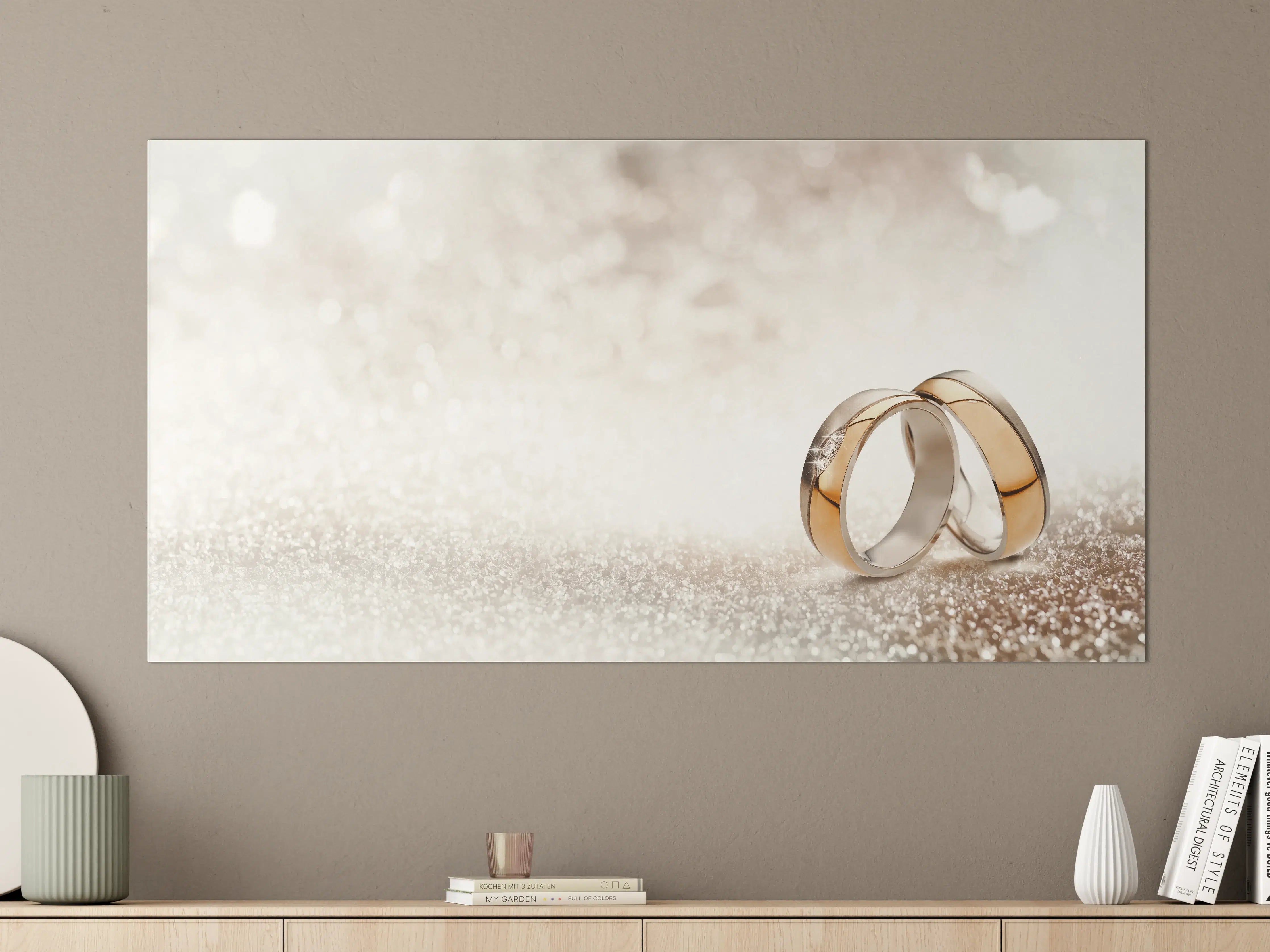 Große Wandbilder - Zwei goldene Eheringe mit Glitter Hintergrund
