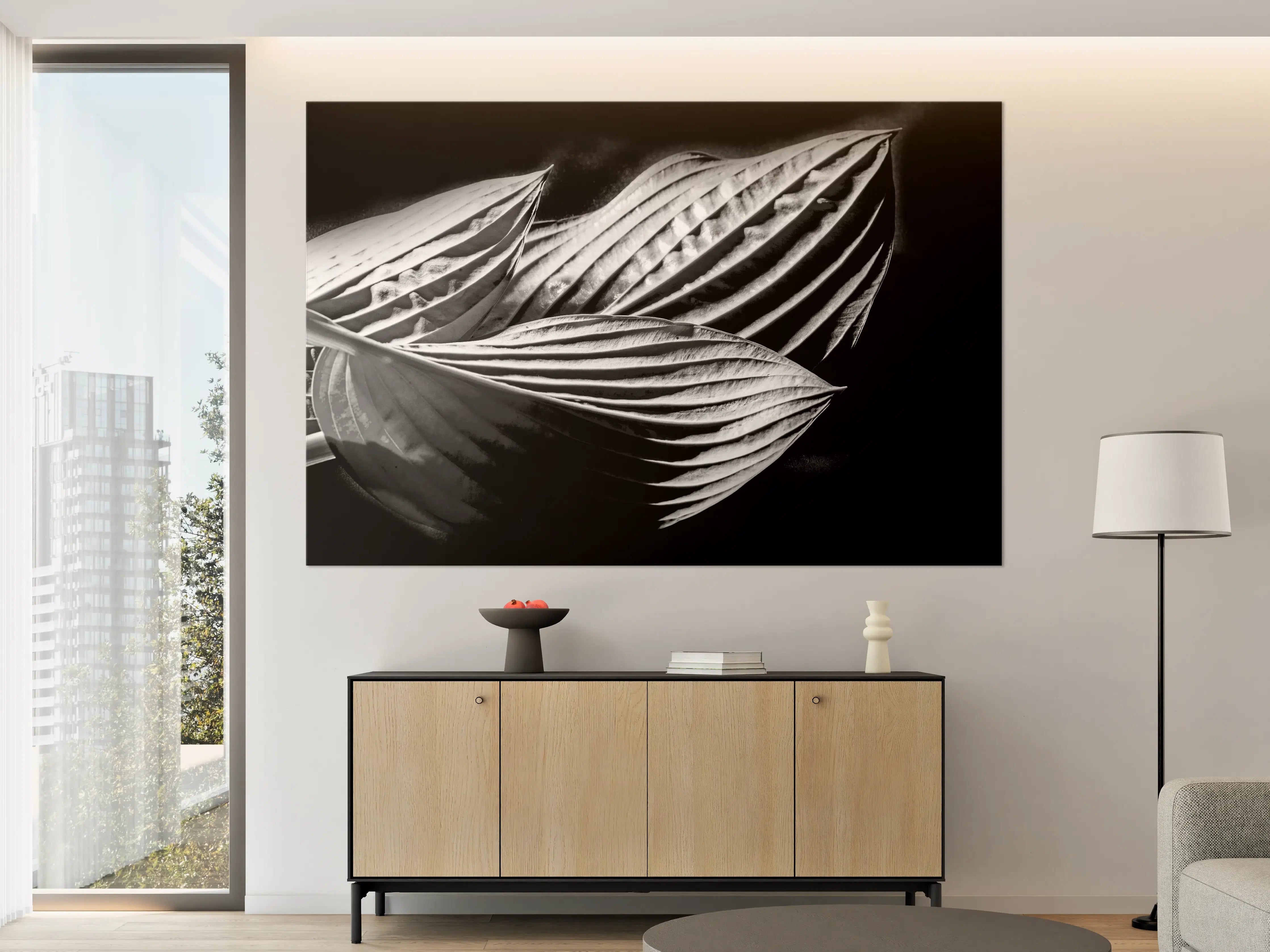 Große Wandbilder - drei Blätter auf dunklem Hintergrund