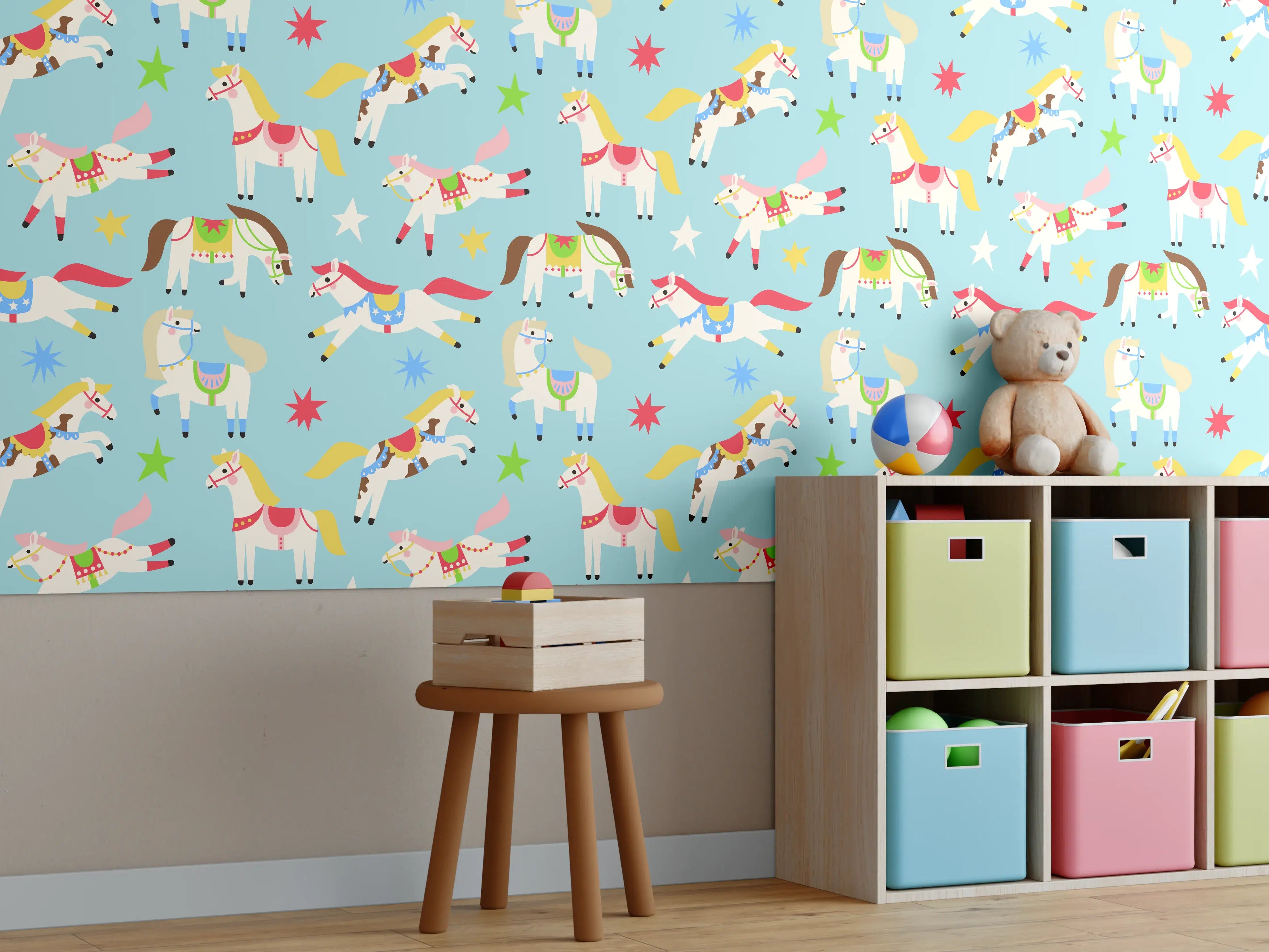 Kinderzimmer Wandgestaltung - Bunte Einhörner auf hellblauem Hintergrund