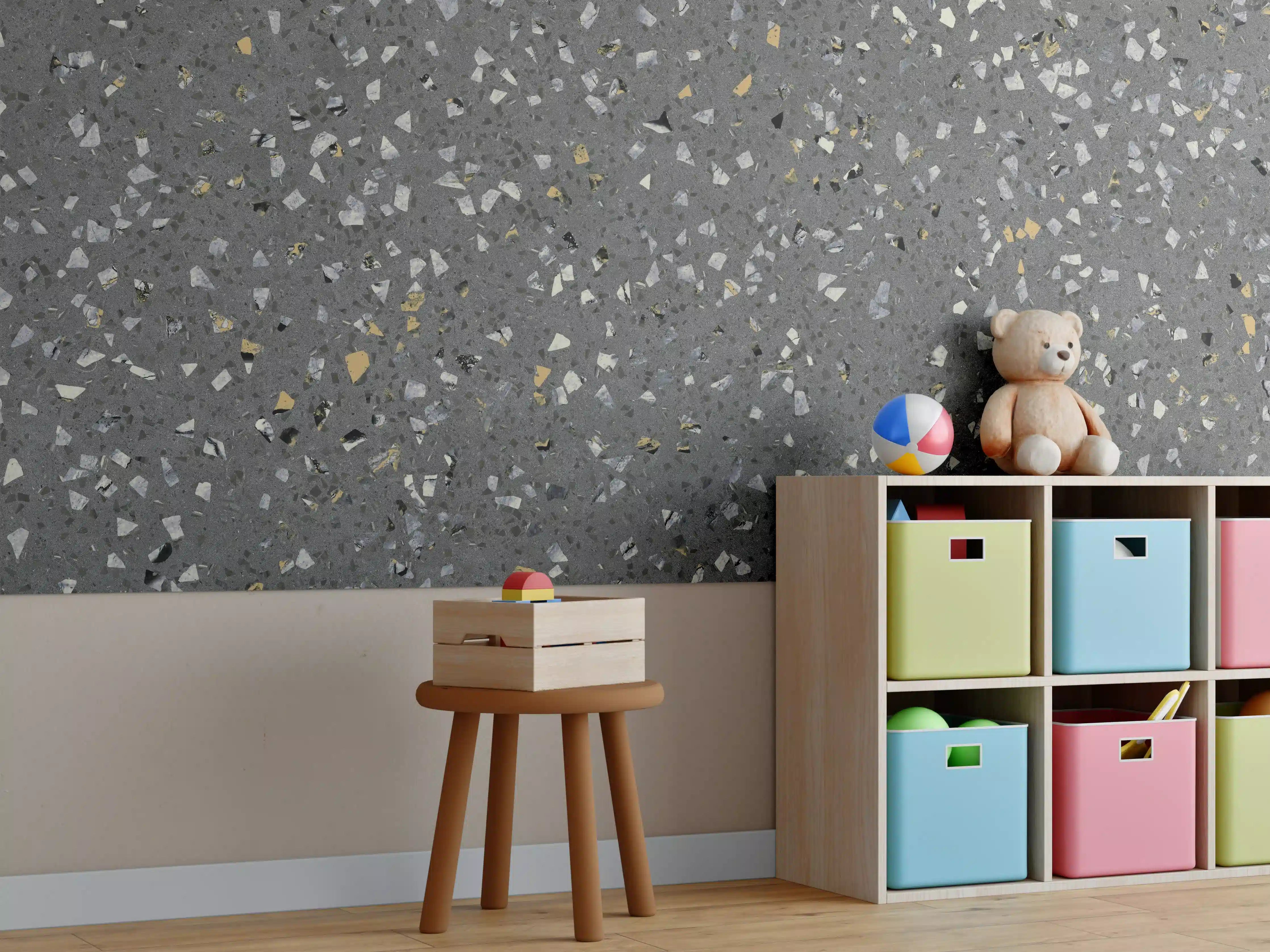 Kinderzimmer Wandgestaltung - Glatte graue Oberfläche mit bunten Chips