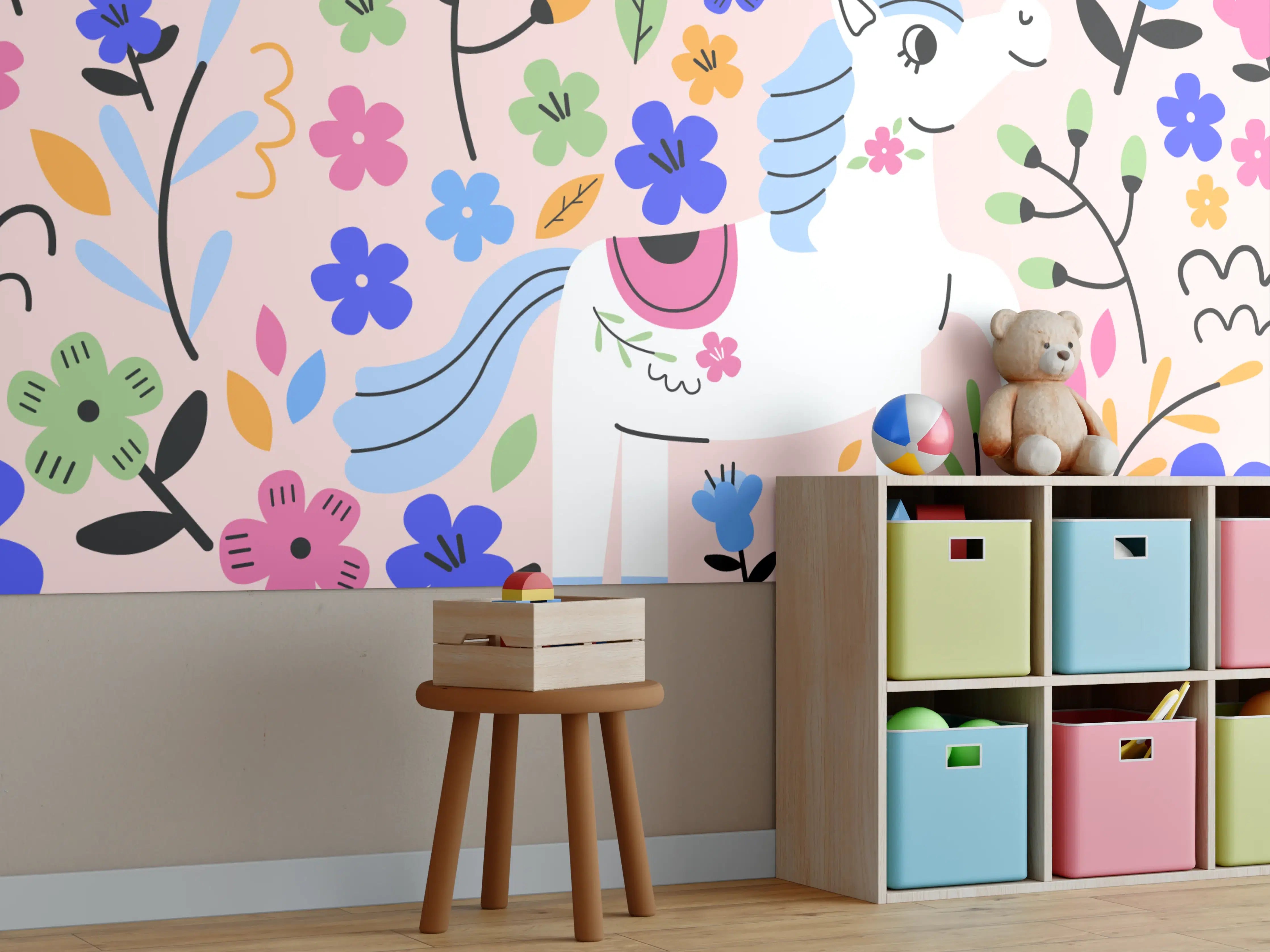 Kinderzimmer Wandgestaltung - Verspieltes Einhorn-Motiv mit bunten Blumen auf rosa Hintergrund