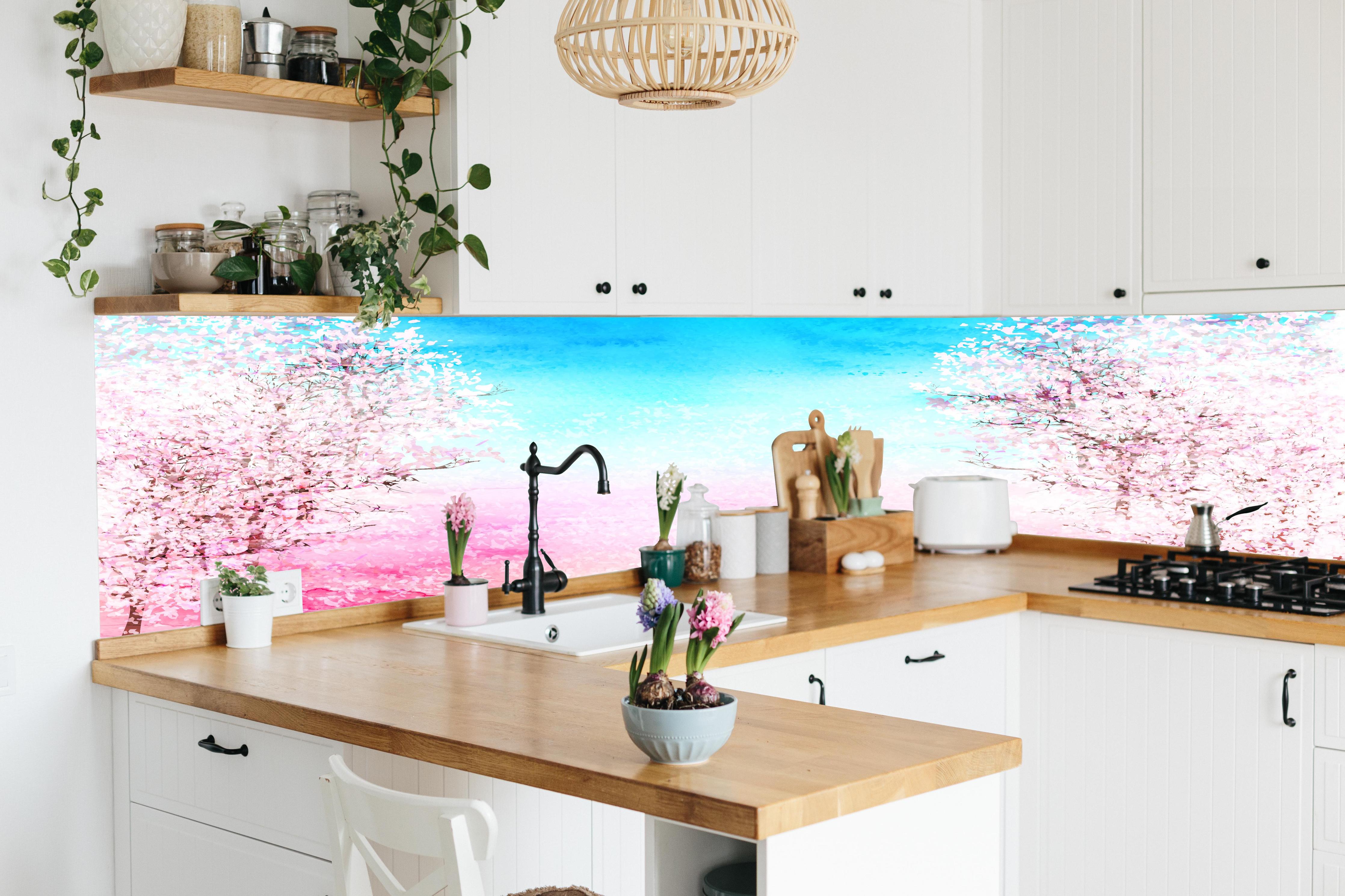 Küche - Frühlingsbaum Aquarell Rosa-Blau hinter weißen Hochglanz-Küchenregalen und schwarzem Wasserhahn
