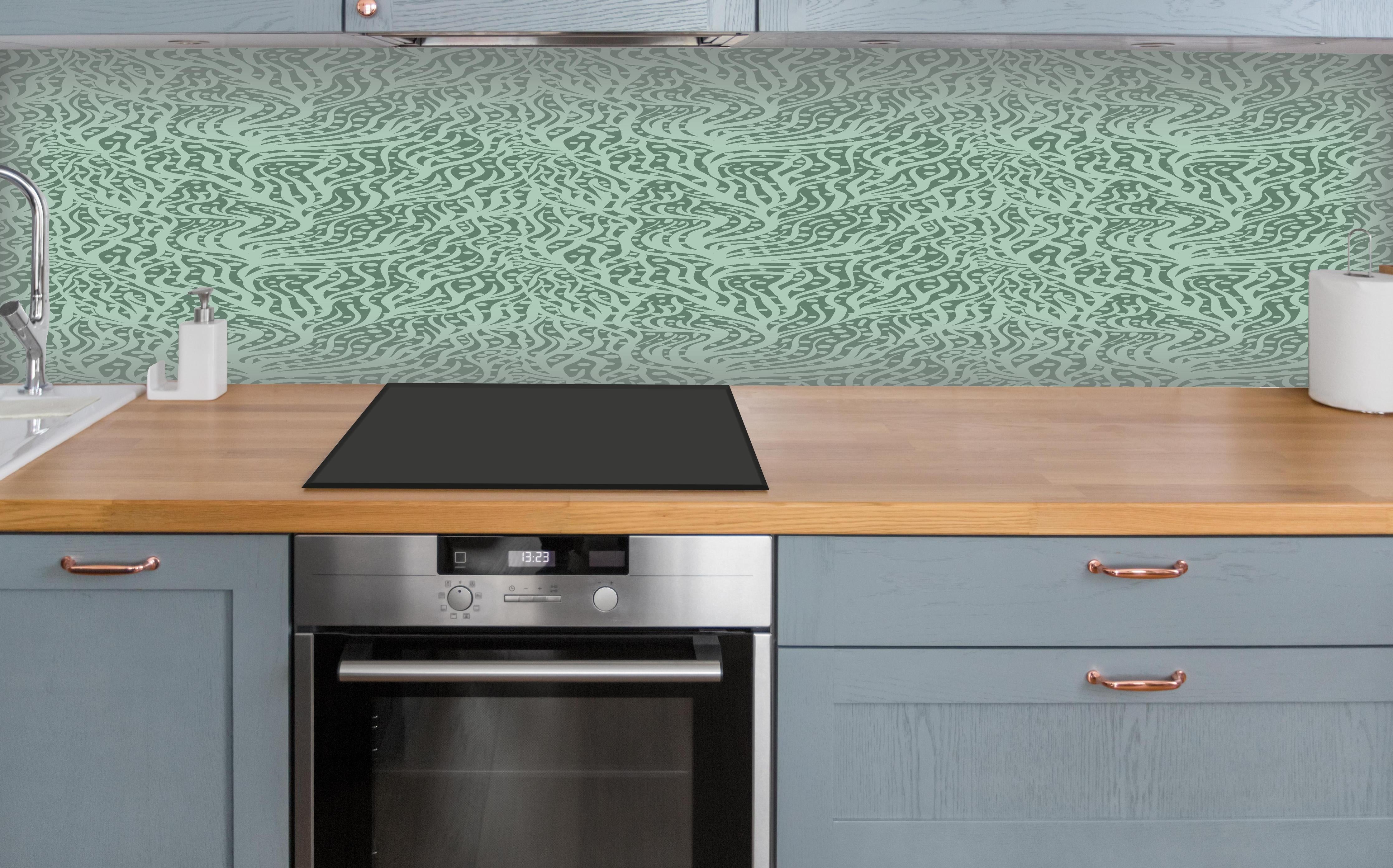 Küche - Abstraktes Korallenmuster Grün-Türkis über polierter Holzarbeitsplatte mit Cerankochfeld