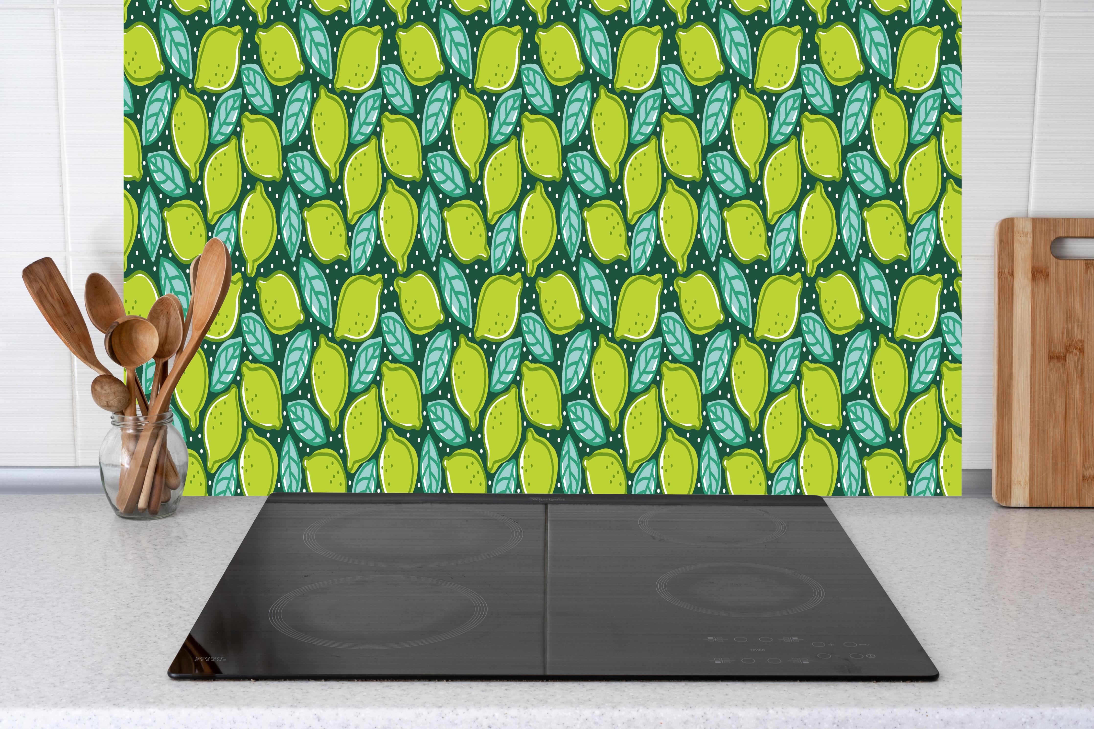 Küche - Lime Dance Zitrus-Muster hinter Cerankochfeld und Holz-Kochutensilien