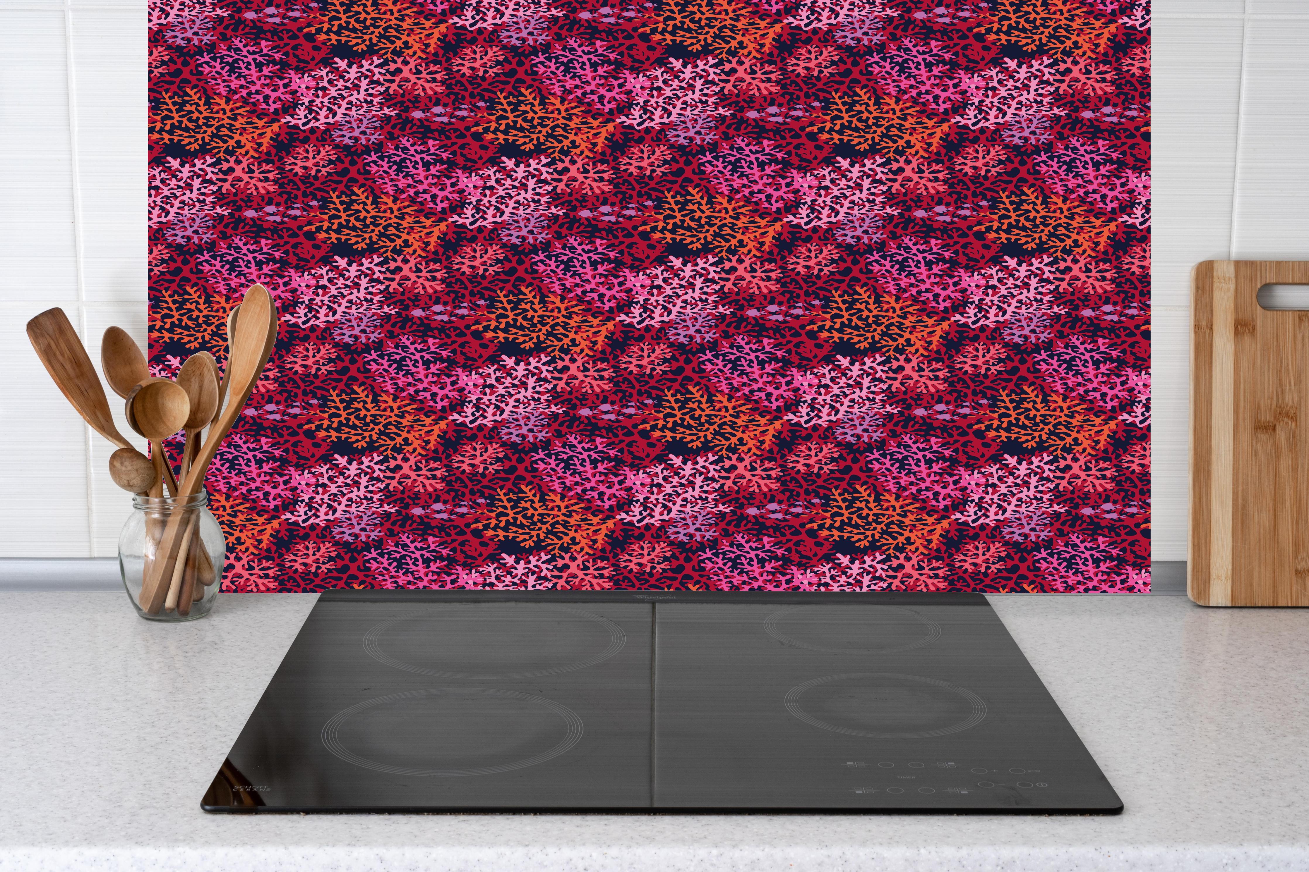 Küche - Neon-Korallen Pink Muster hinter Cerankochfeld und Holz-Kochutensilien