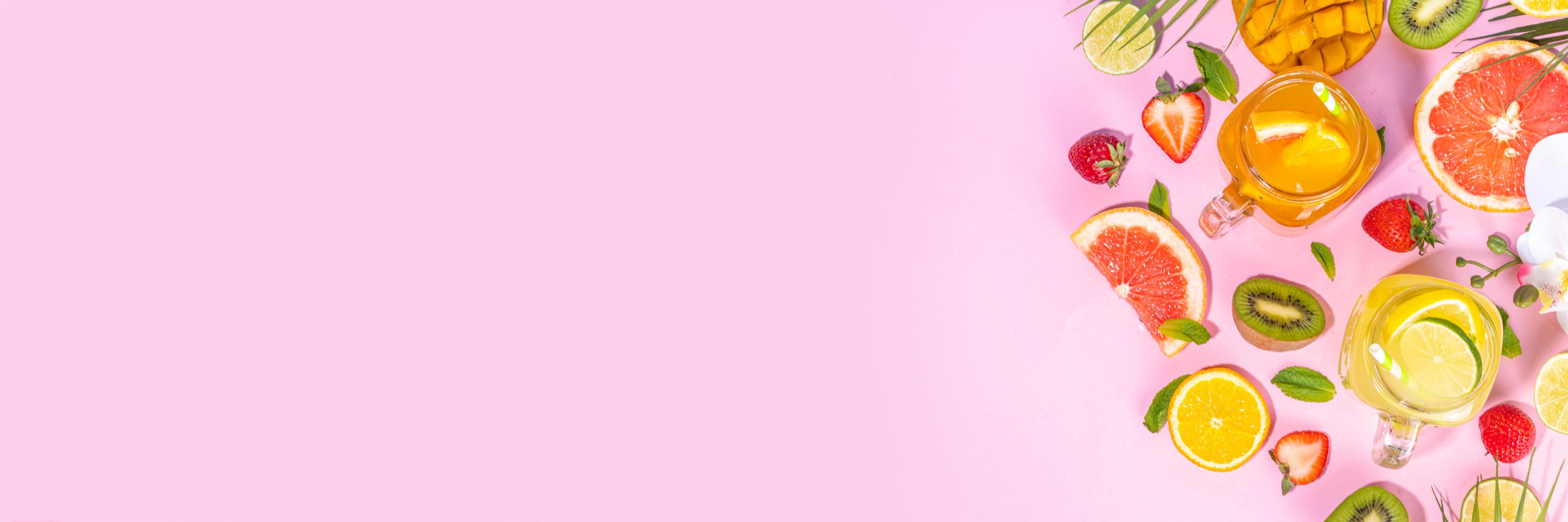 Küchenrückwand-Zitrusfrüchte auf rosa Hintergrund