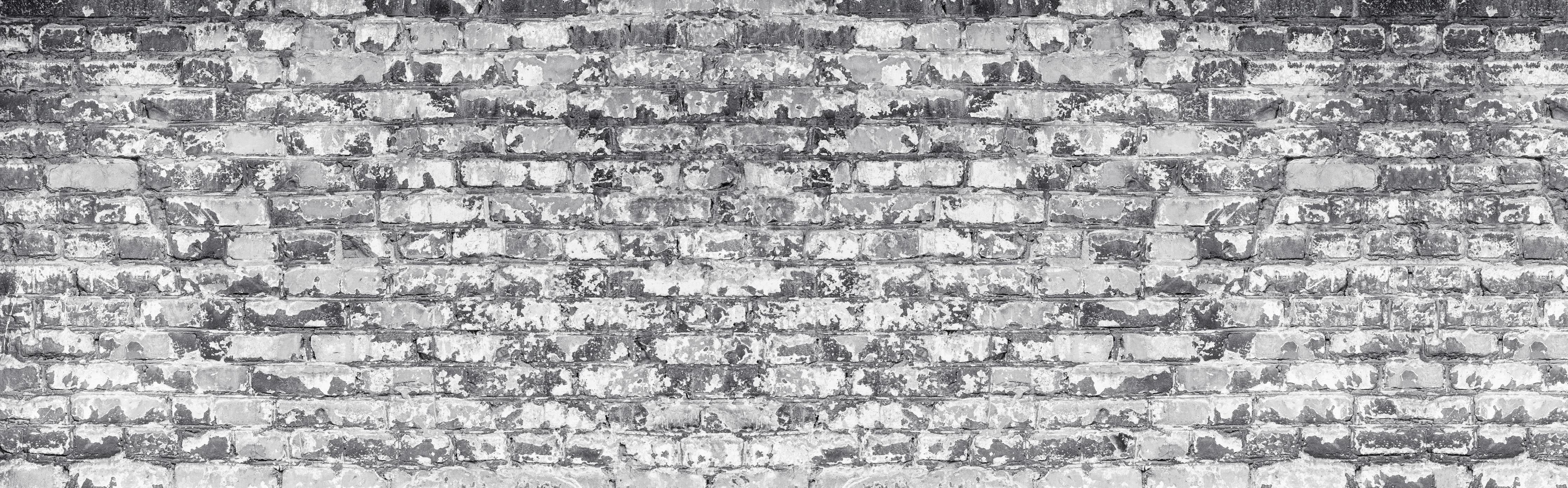 Küchenrückwand- Hellgraue verwitterte Vintage Ziegelwand