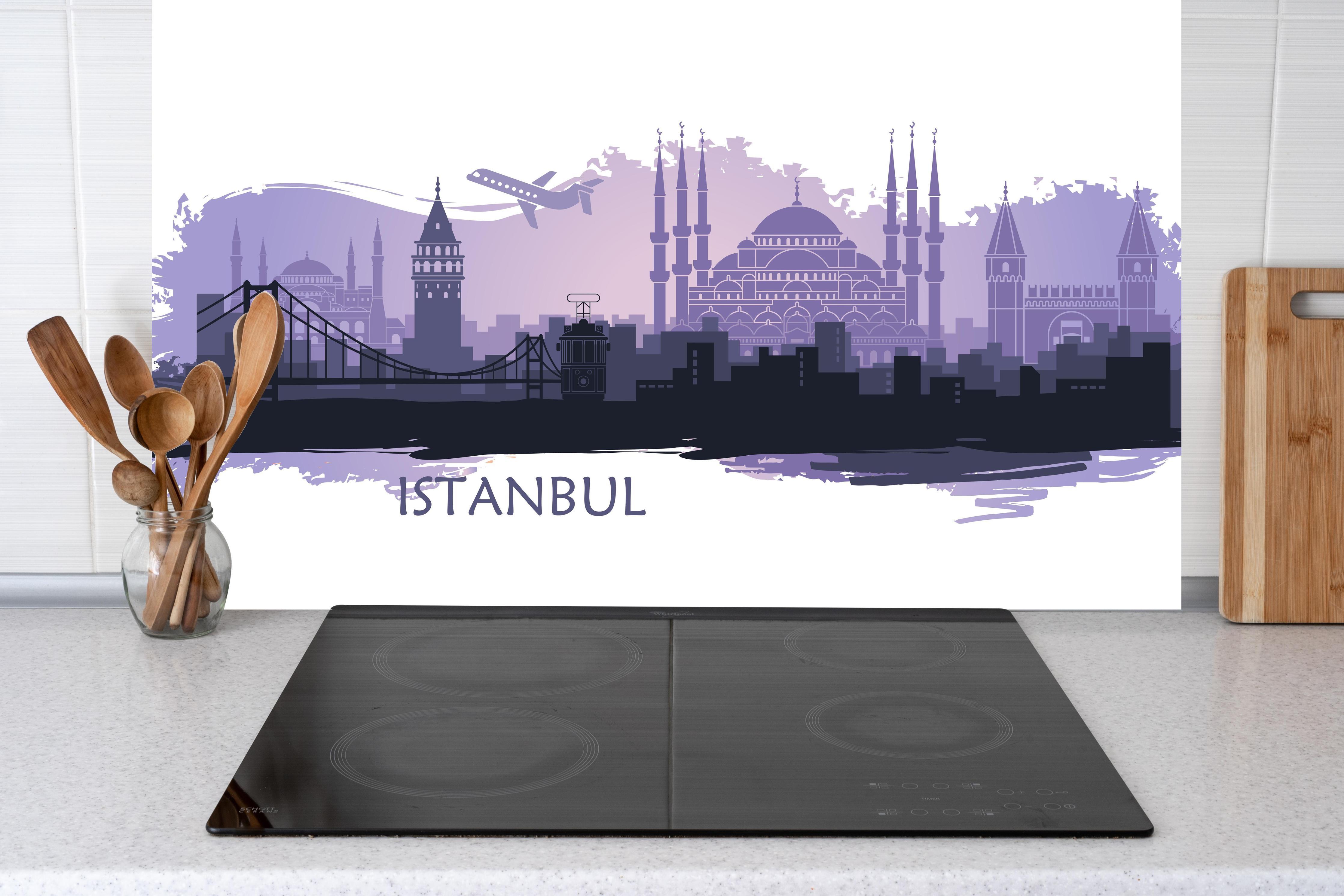 Küche - Istanbul Painting hinter Cerankochfeld und Holz-Kochutensilien