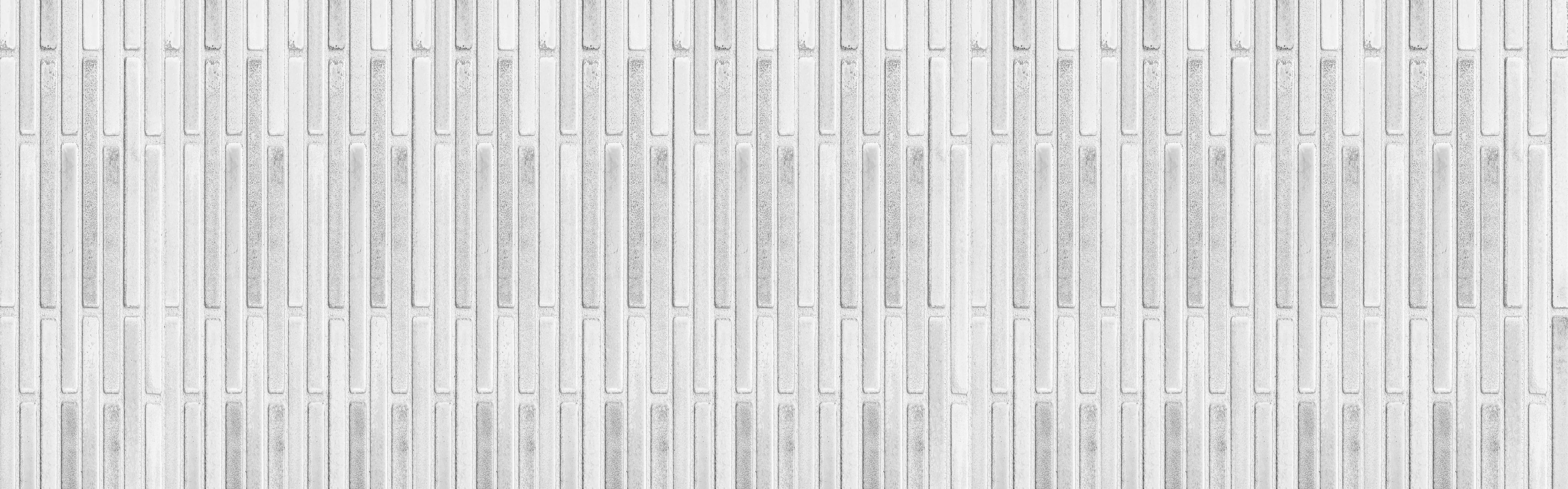 Küchenrückwand-Panorama der weißen Steinwand mit Streifen Textur