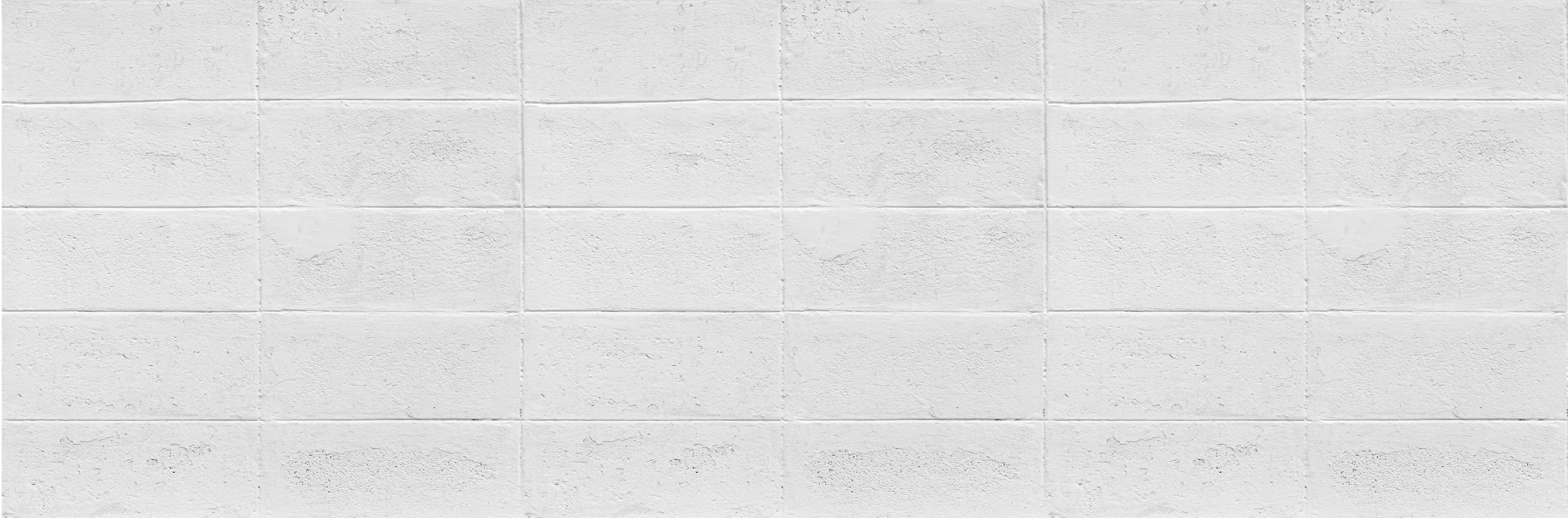 Küchenrückwand-Weißer Zementblock Zaun